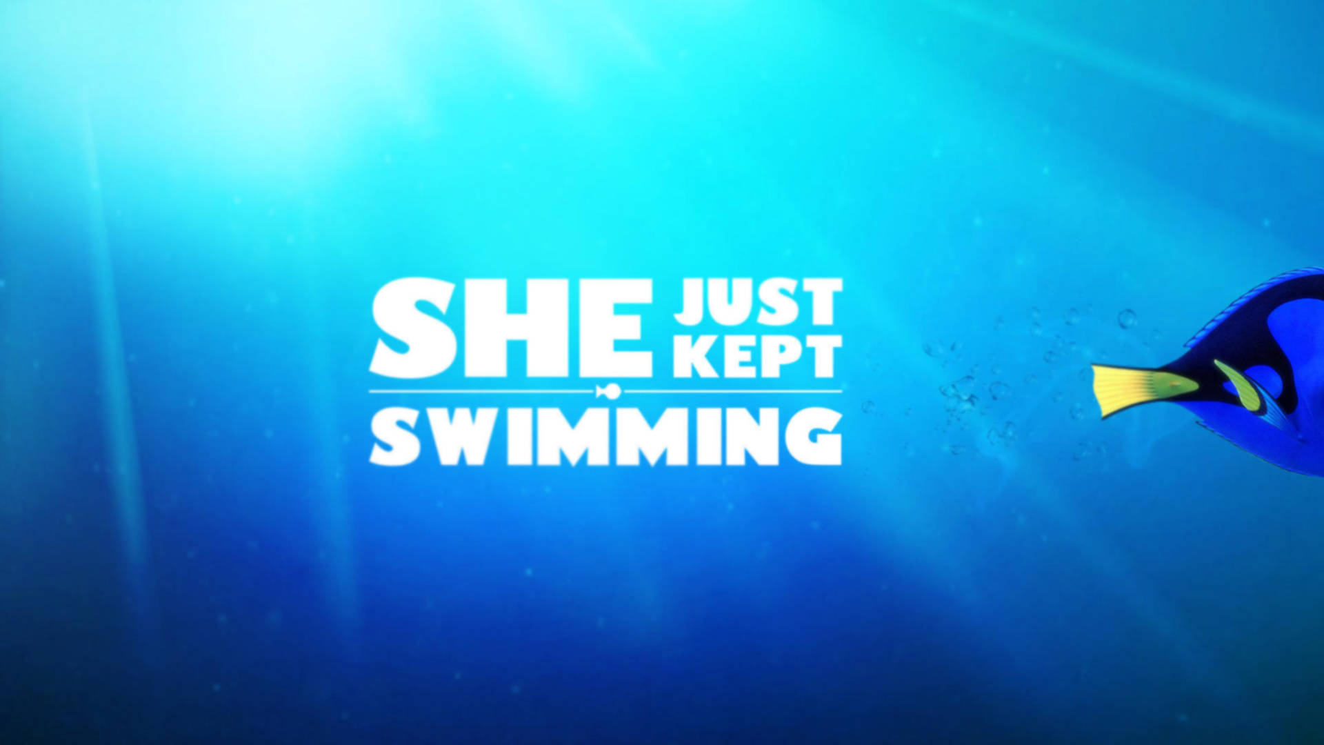 藍色刺尾魚在陽光照耀的海洋中游過文字「She Just Kept Swimming」。