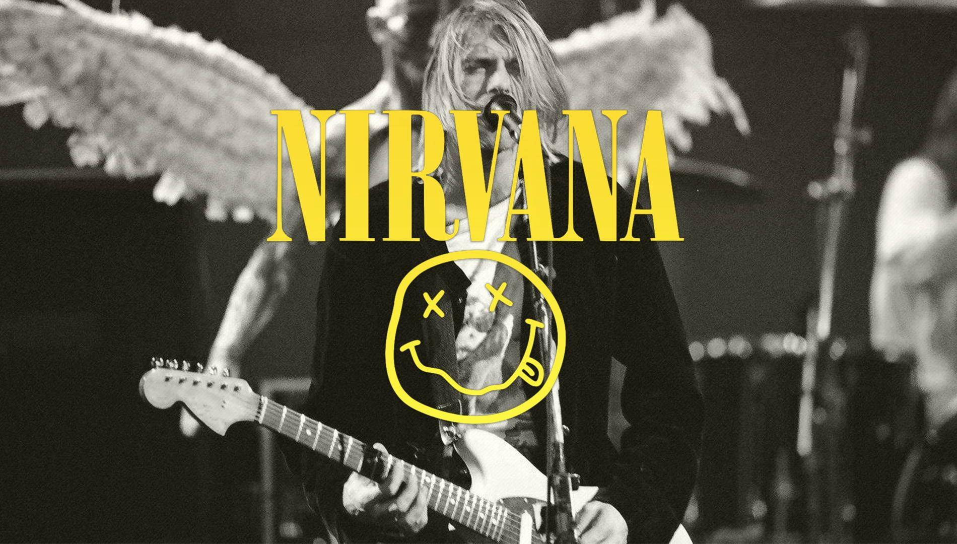 Kurt Cobain 彈結他，帶有天使翅膀和Nirvana標誌。