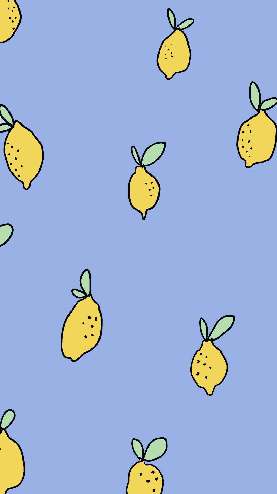 黃色檸檬配綠色葉子在藍色背景上形成重複圖案。