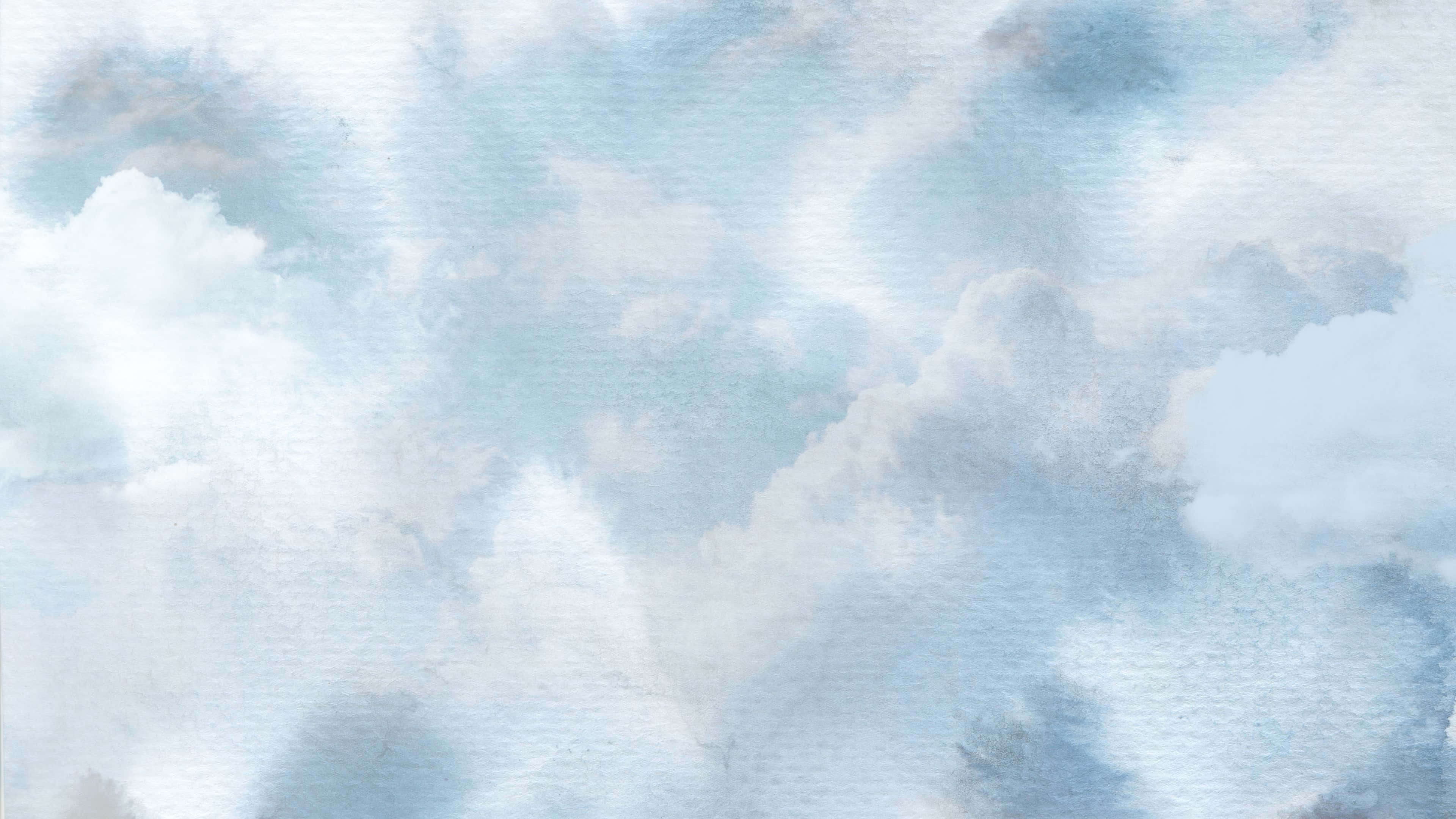 唯美雲朵動態 桌布 壁紙 — 淡藍色和白色的柔和水彩雲朵在寧靜的天空中飄浮，帶有輕柔的紋理。
