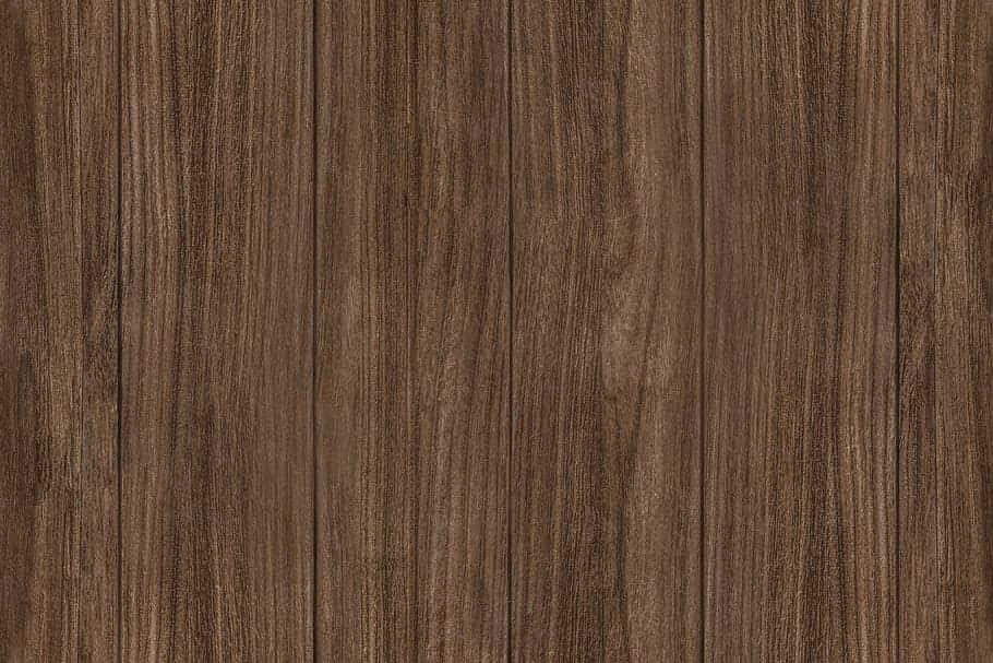 Brown Wood 桌布 壁紙 — 深棕色厚木板的特寫，帶有天然木紋圖案和微妙的垂直接縫。