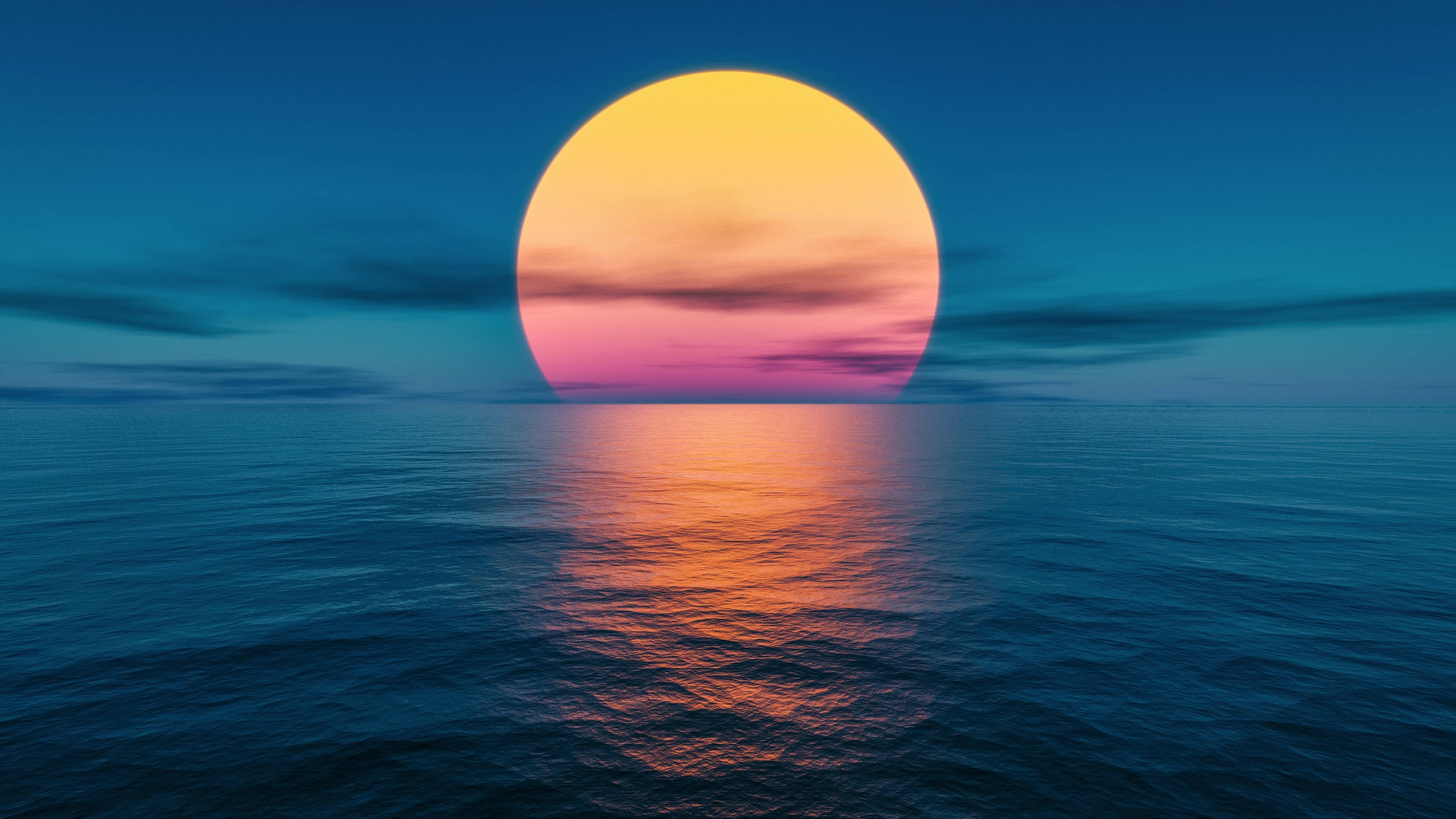 深海夕照壁紙 壁紙 — 巨大的太陽在平靜的海面上落下，在深藍色的天空和反射的水面上投射出溫暖的橙色和粉紅色調。