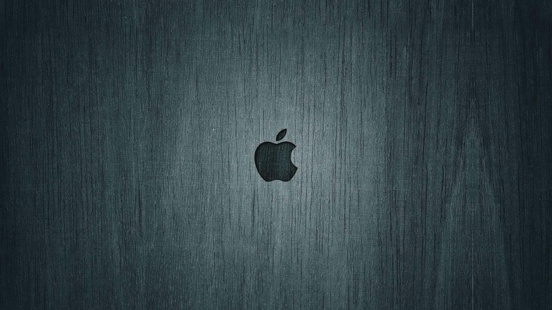 拉絲金屬背景上的Apple標誌