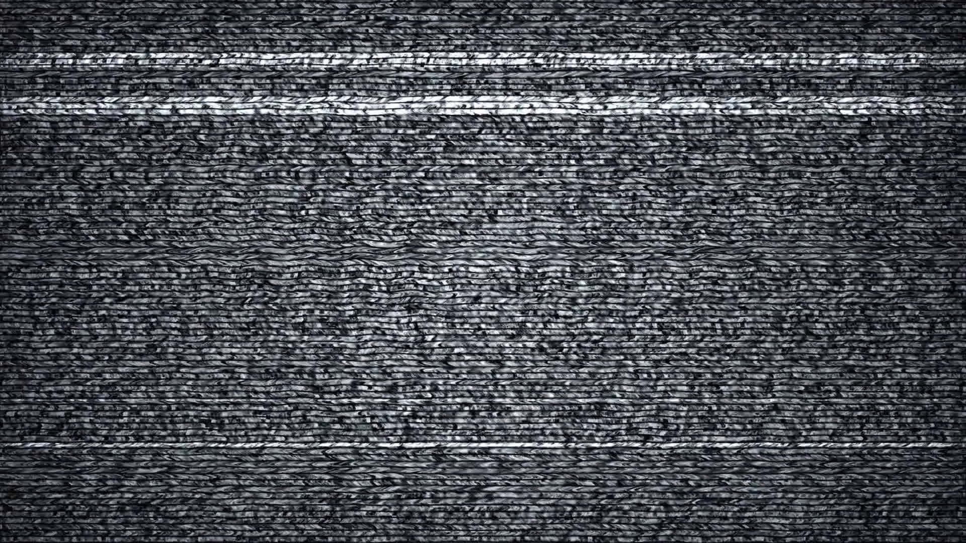 靜態gif 桌布 壁紙 — 深灰色紋理布料特寫，帶有橫向編織條紋和細微白色高光。