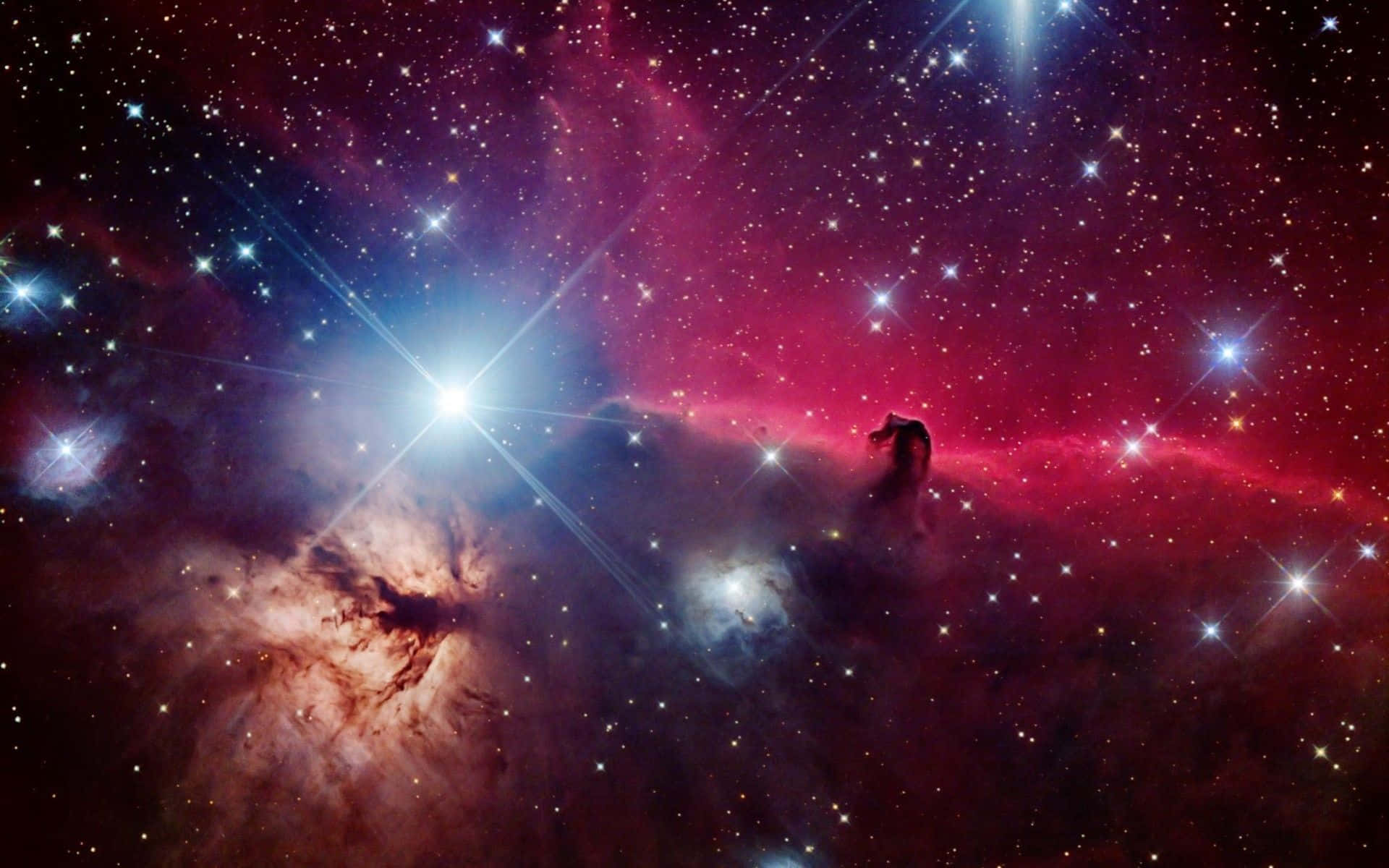 充滿活力的宇宙星雲，在深邃的太空中閃耀著恆星和旋轉的塵埃雲。