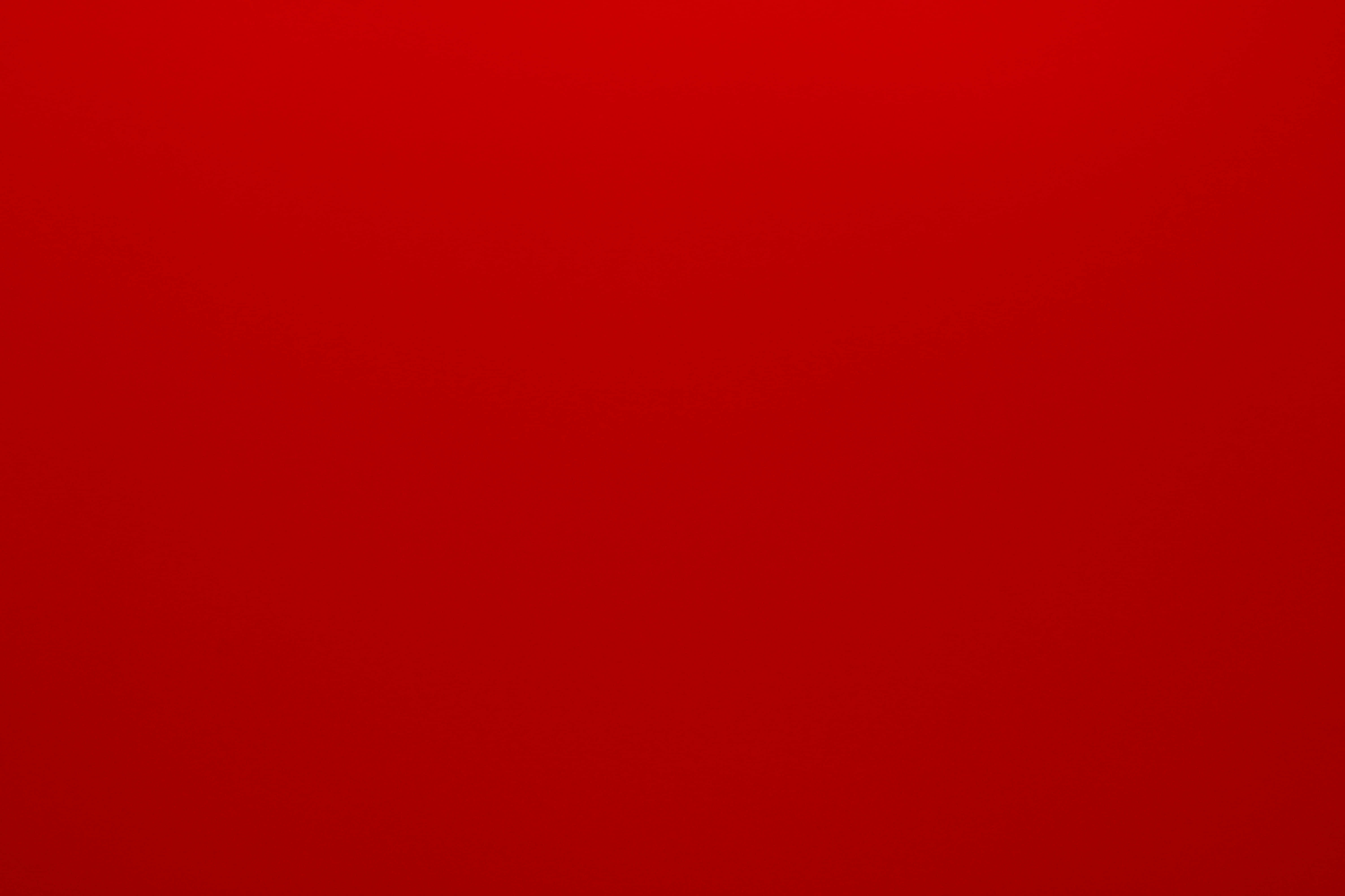 Solid Red 桌布 壁紙 — 深紅色平滑漸變，在整個畫面中微妙地淡出。