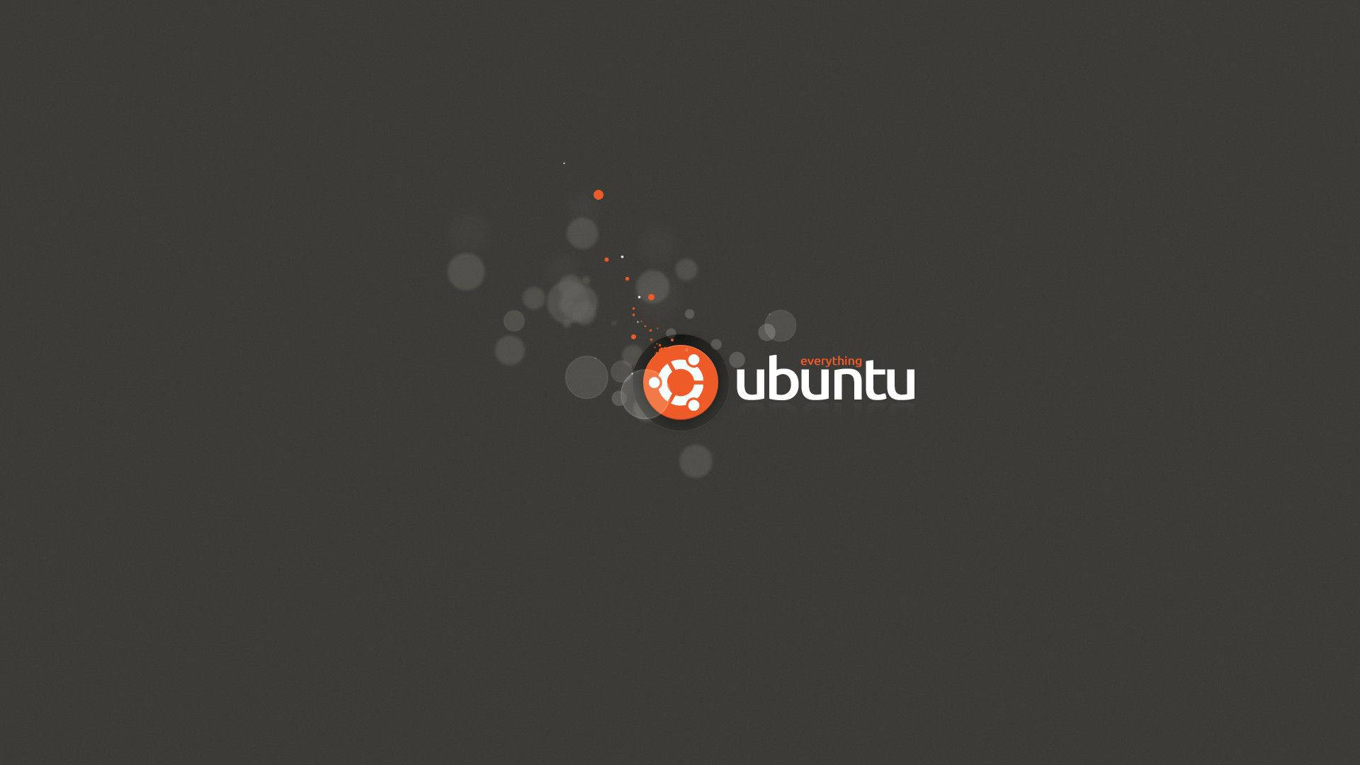 Ubuntu 標誌，橙色圓圈和白色文字在深灰色背景上。
