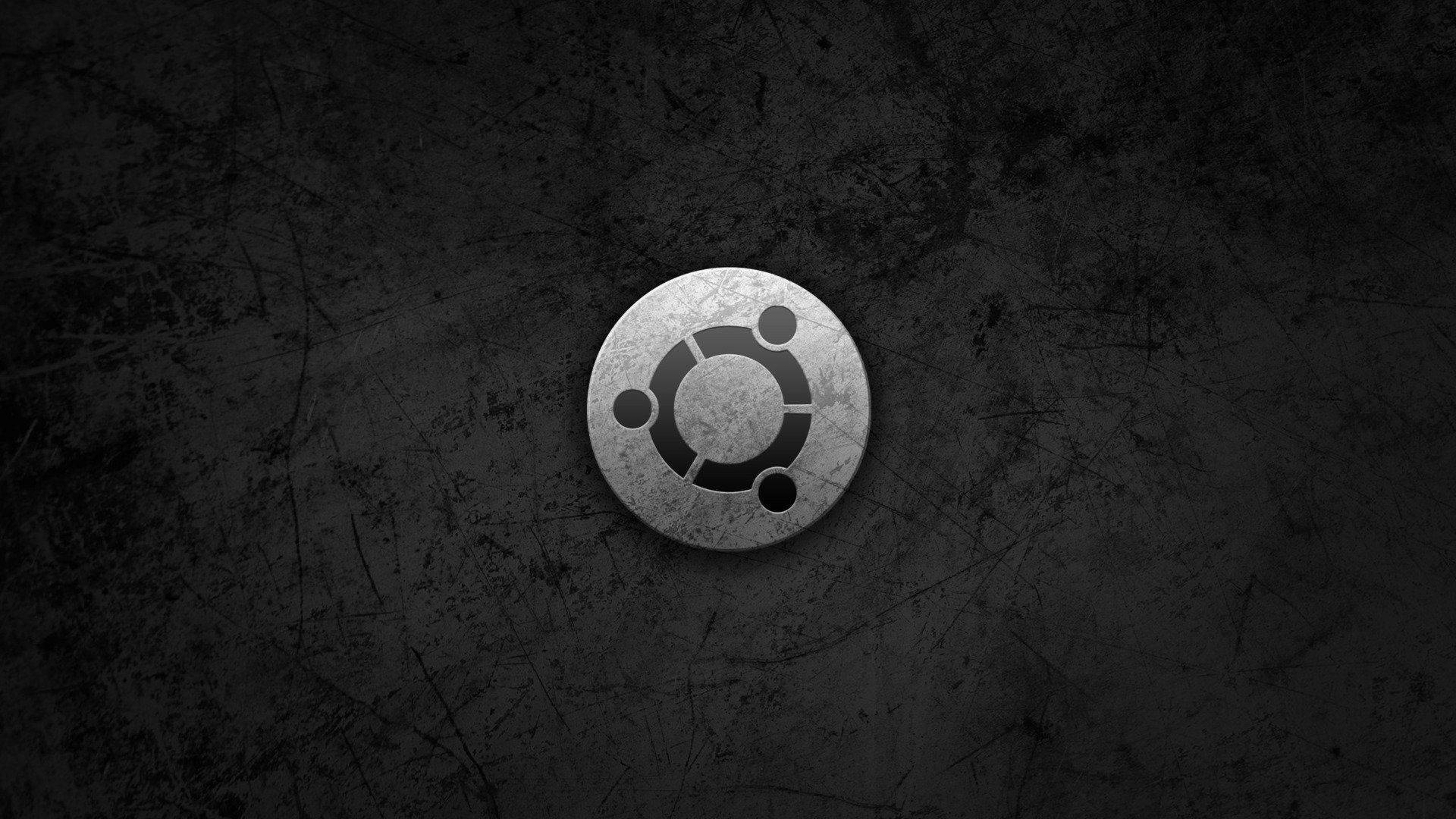 深色紋理背景上的 Ubuntu 標誌