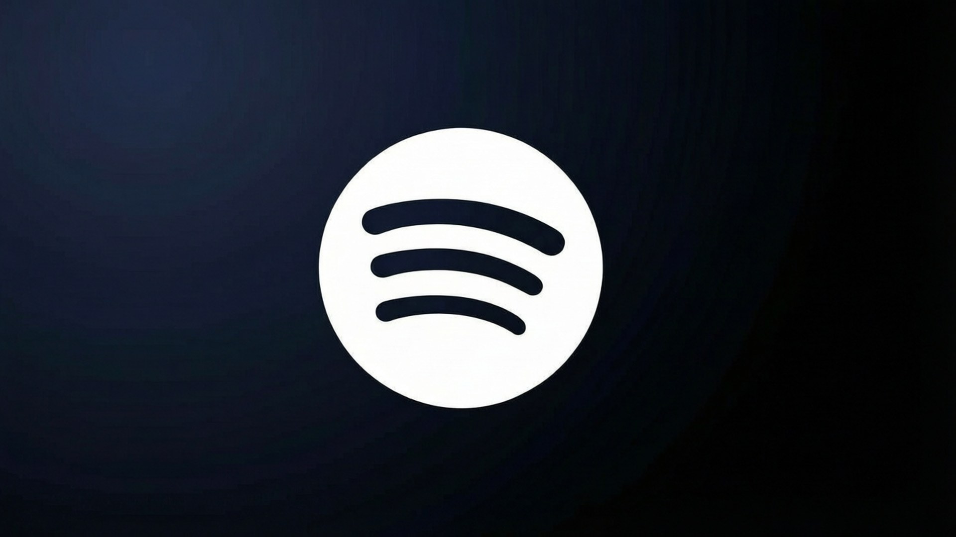 深色漸變極簡風格 壁紙 — Spotify 標誌居中白色，背景為深藍色漸變，帶有微妙的徑向模糊。