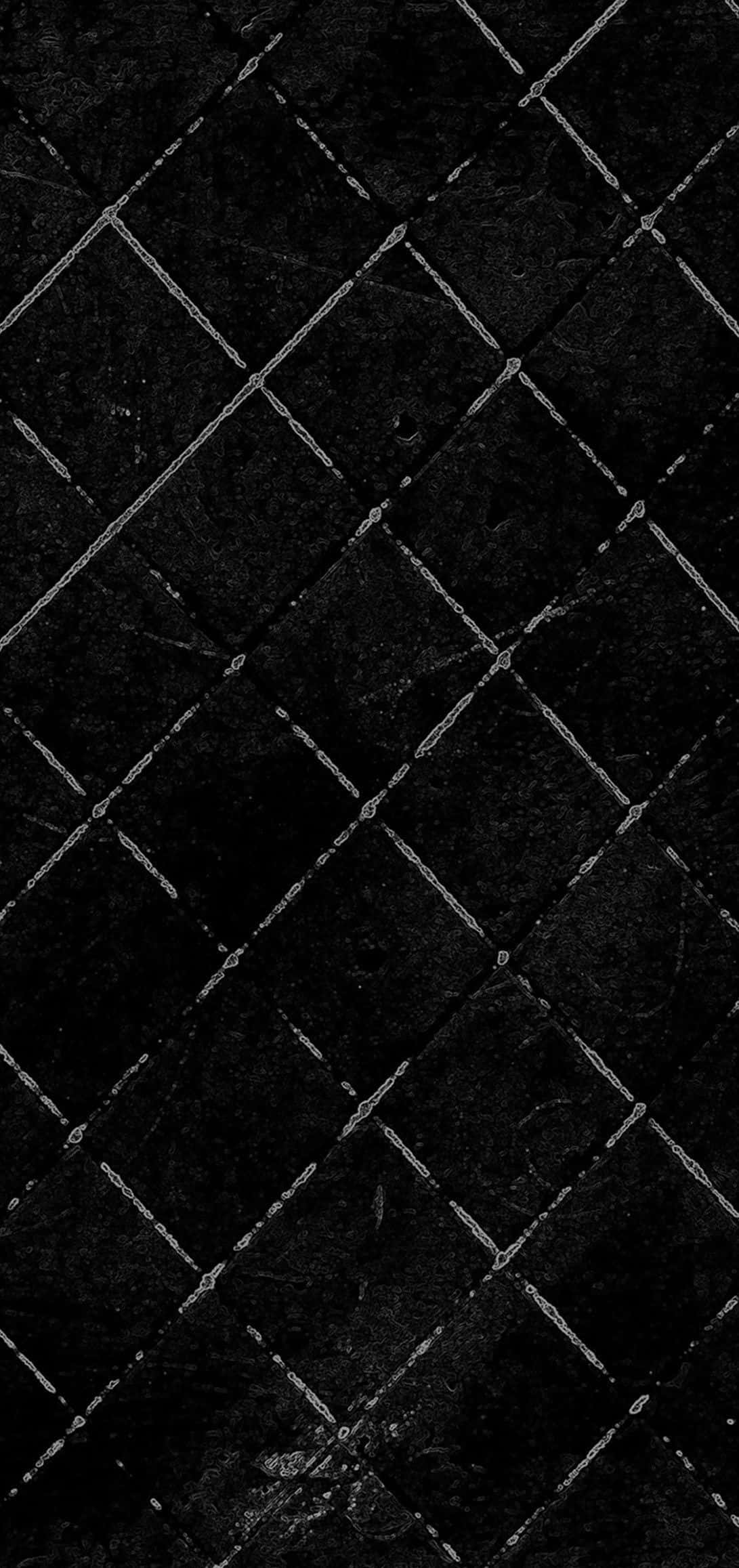 Aesthetic Grunge Phone 桌布 壁紙 — 深色紋理表面，帶有以淡銀色線條蝕刻的微妙菱形網格圖案。
