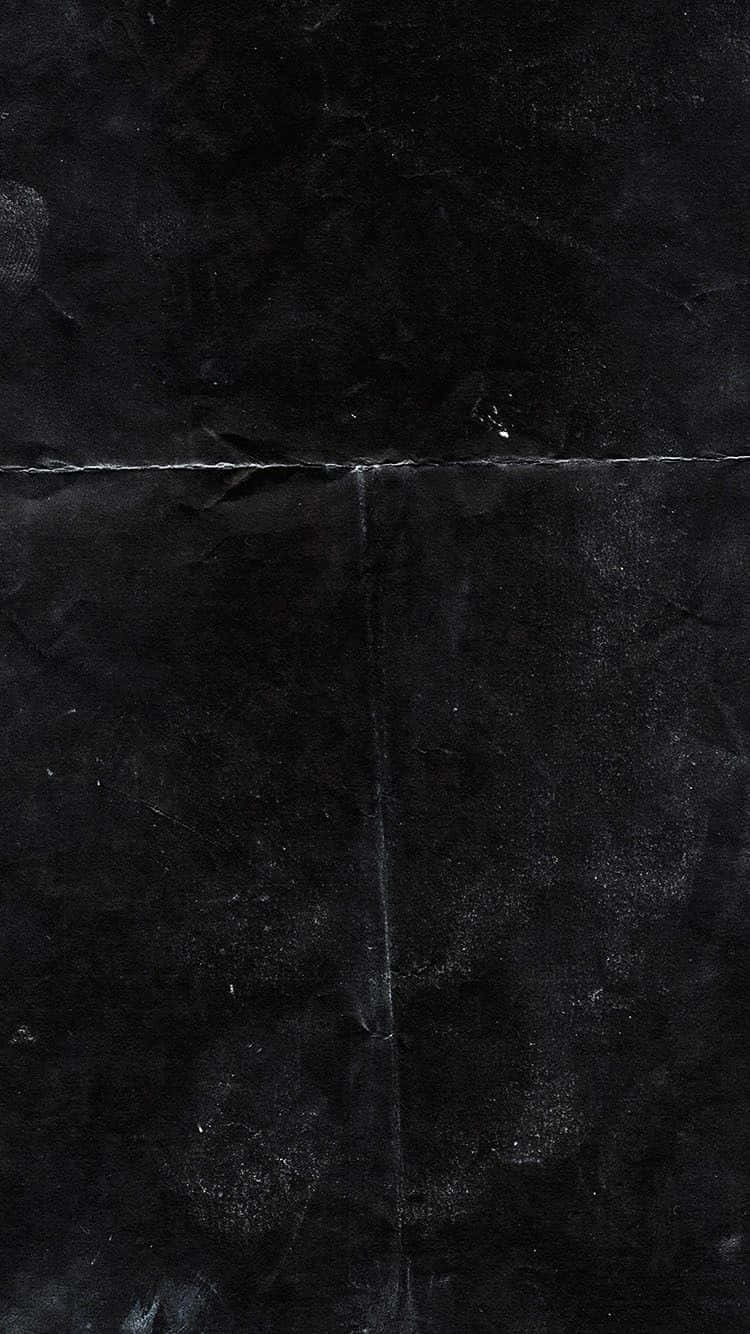 Dark Grunge 桌布 壁紙 — 深色紋理黑色大理石瓷磚的特寫，帶有細微的灰色紋理和可見的填縫線。