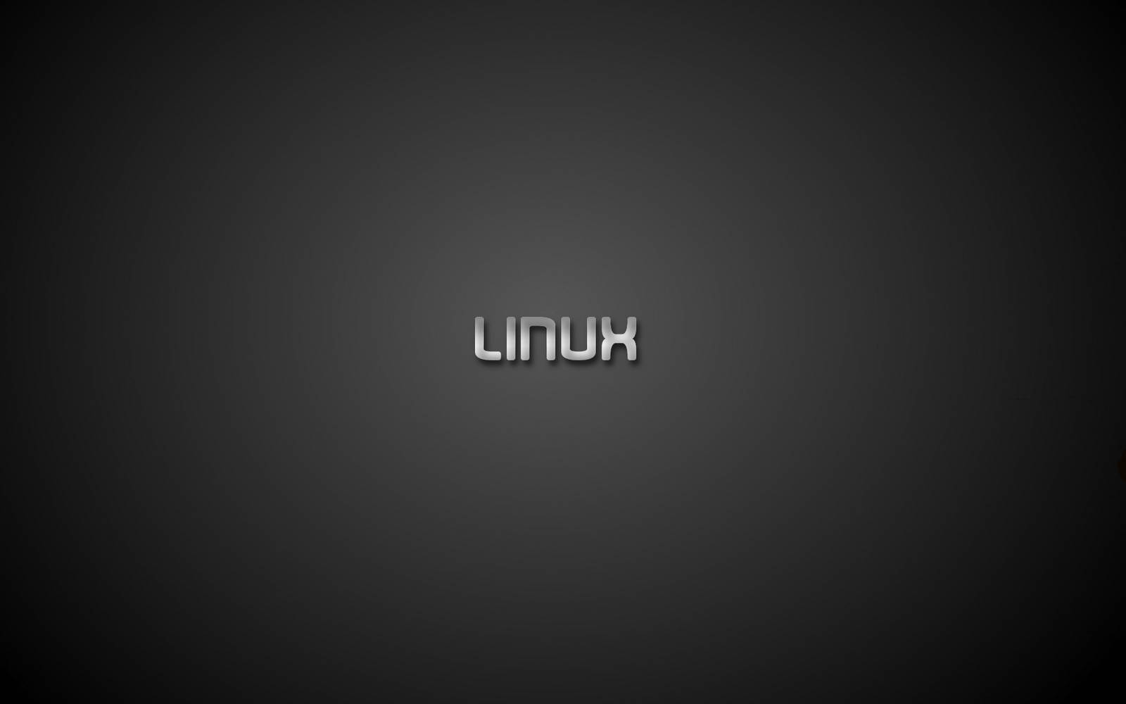 深色漸變背景上的 Linux 文字標誌