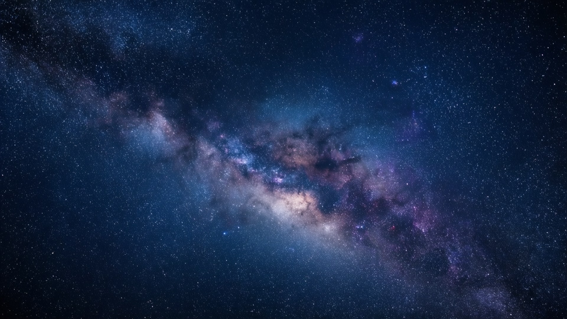 深邃太空中，一個令人驚嘆的深藍色星系，點綴著繁星與星雲。