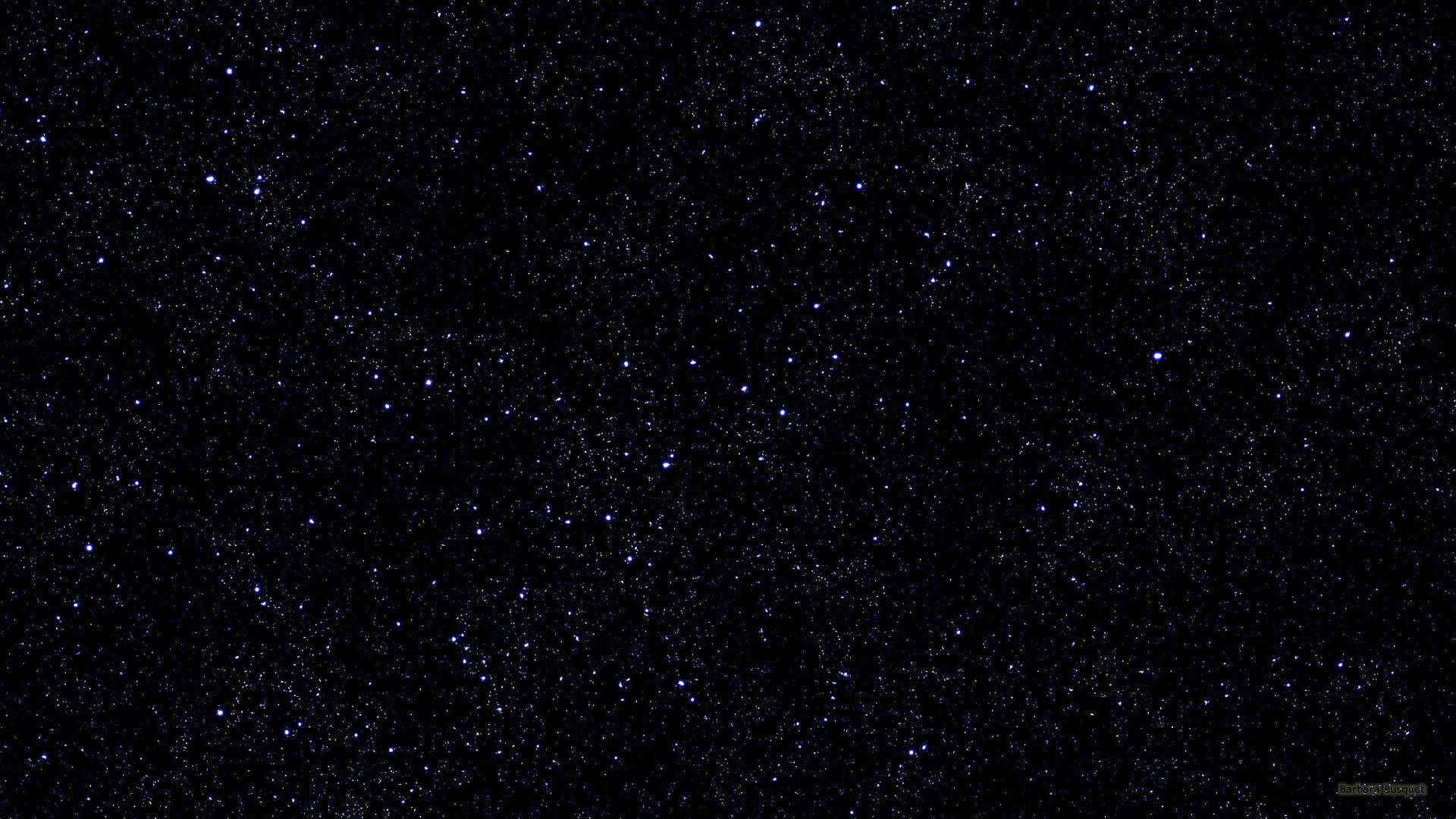 深邃黑色背景上，無數閃爍星星的星空。