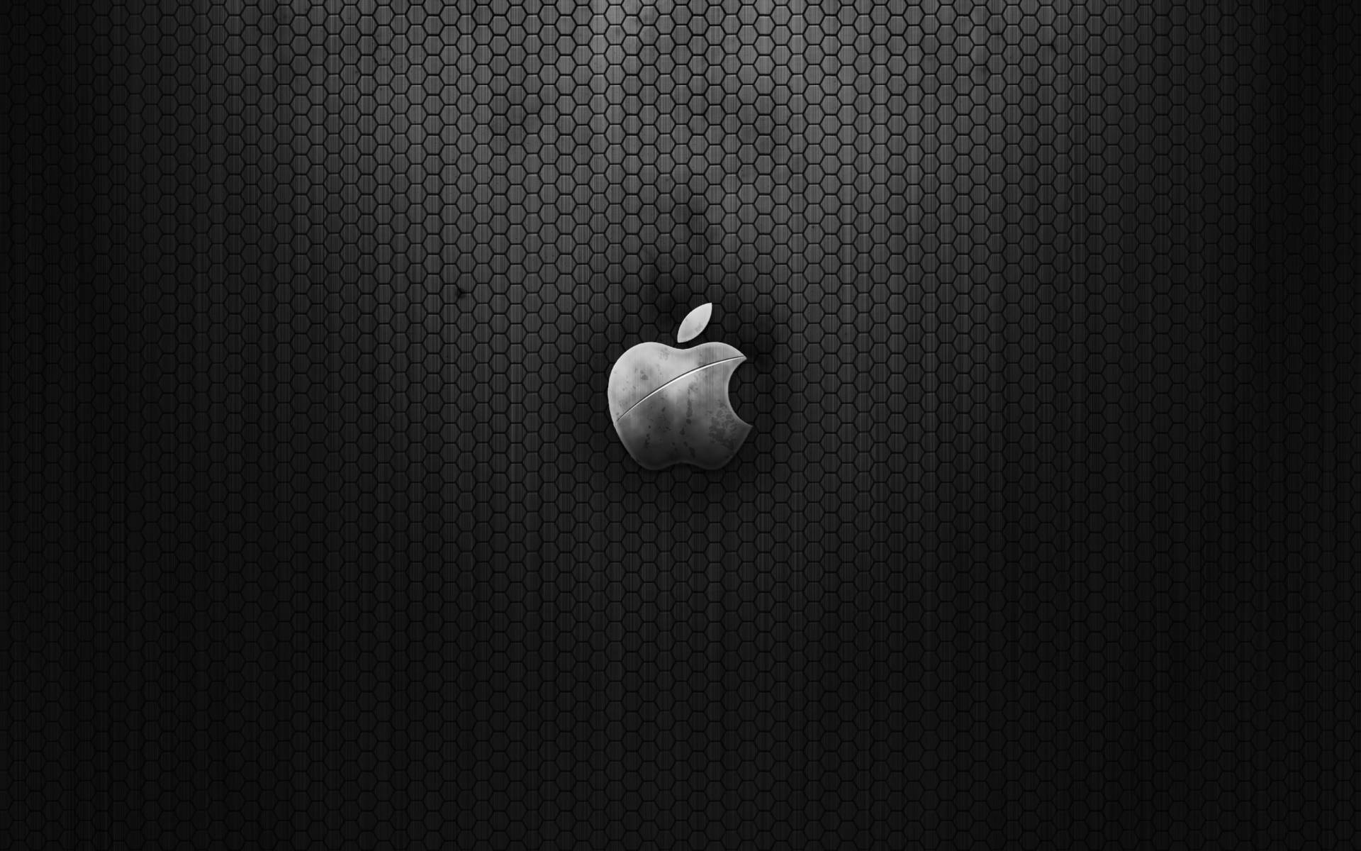 深色六角網格背景上的Apple標誌