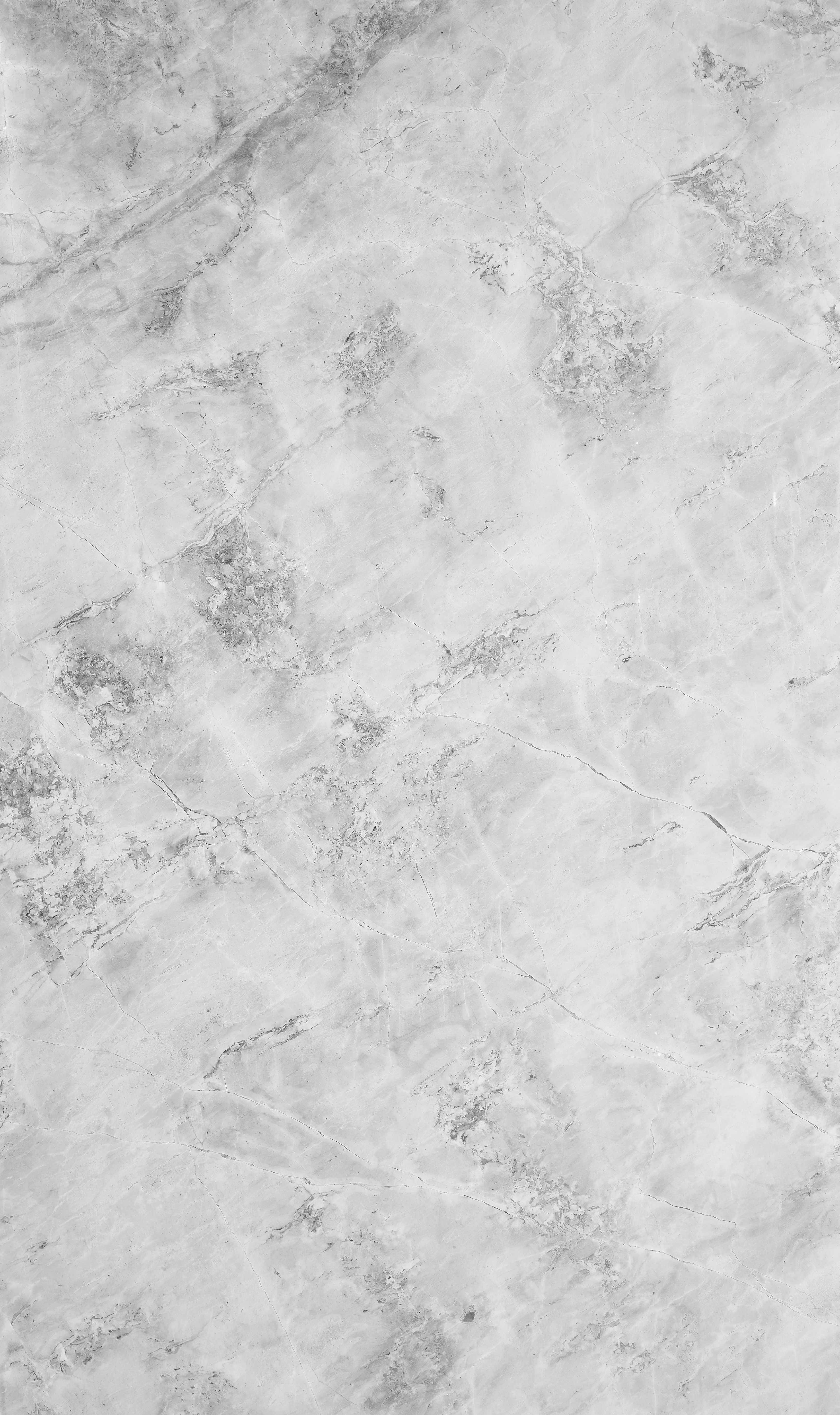 Grey Marble 桌布 壁紙 — 淺灰色大理石表面的特寫，帶有細微紋理和天然石材質感。