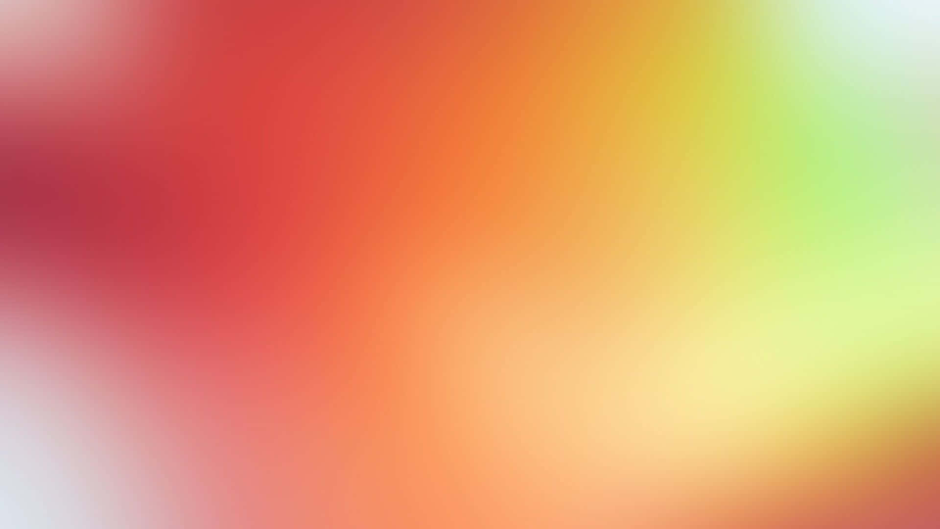 平滑的抽象漸變，將溫暖的紅色、橙色、黃色與淡綠色和白色混合。