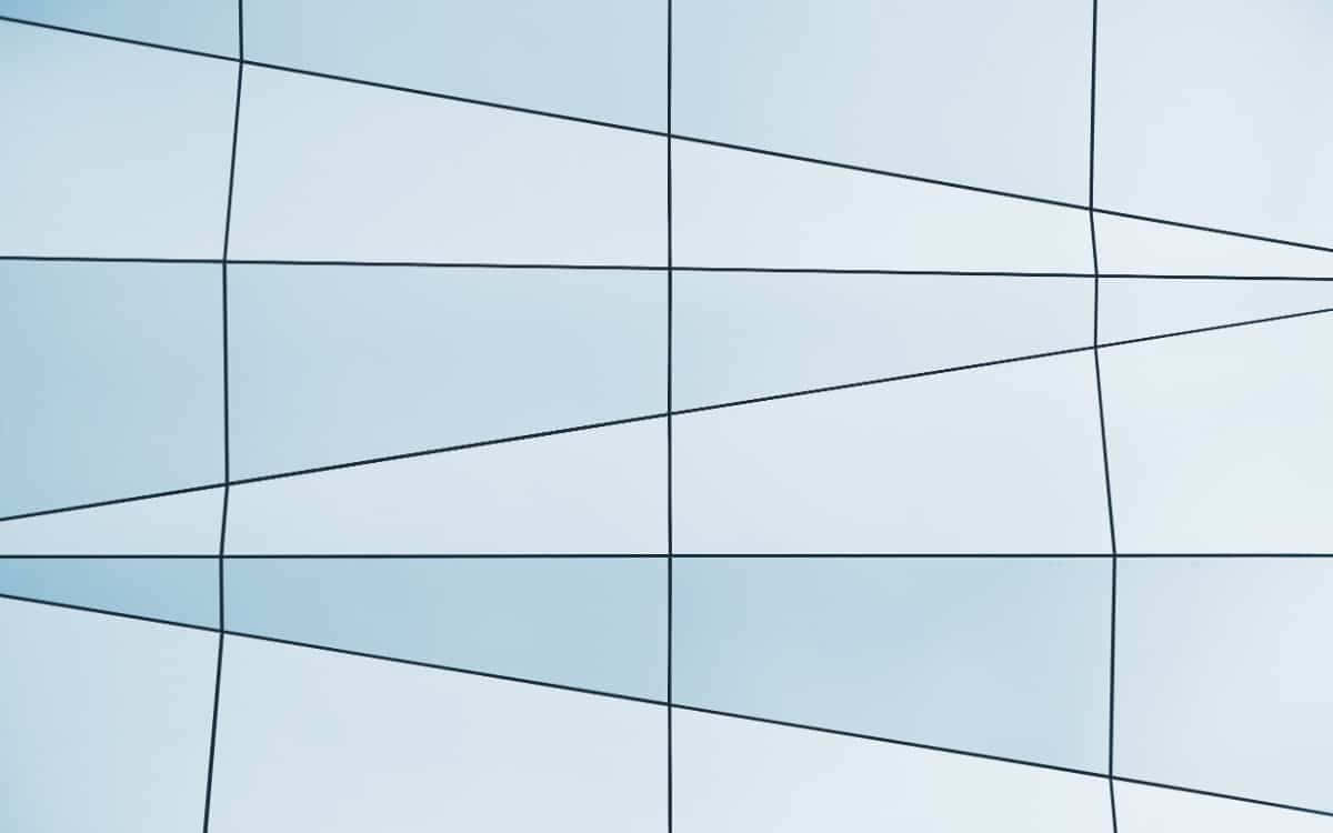 Beautiful Minimalist 桌布 壁紙 — 淺藍色面板的幾何網格，帶有向消失點匯聚的黑色線條。
