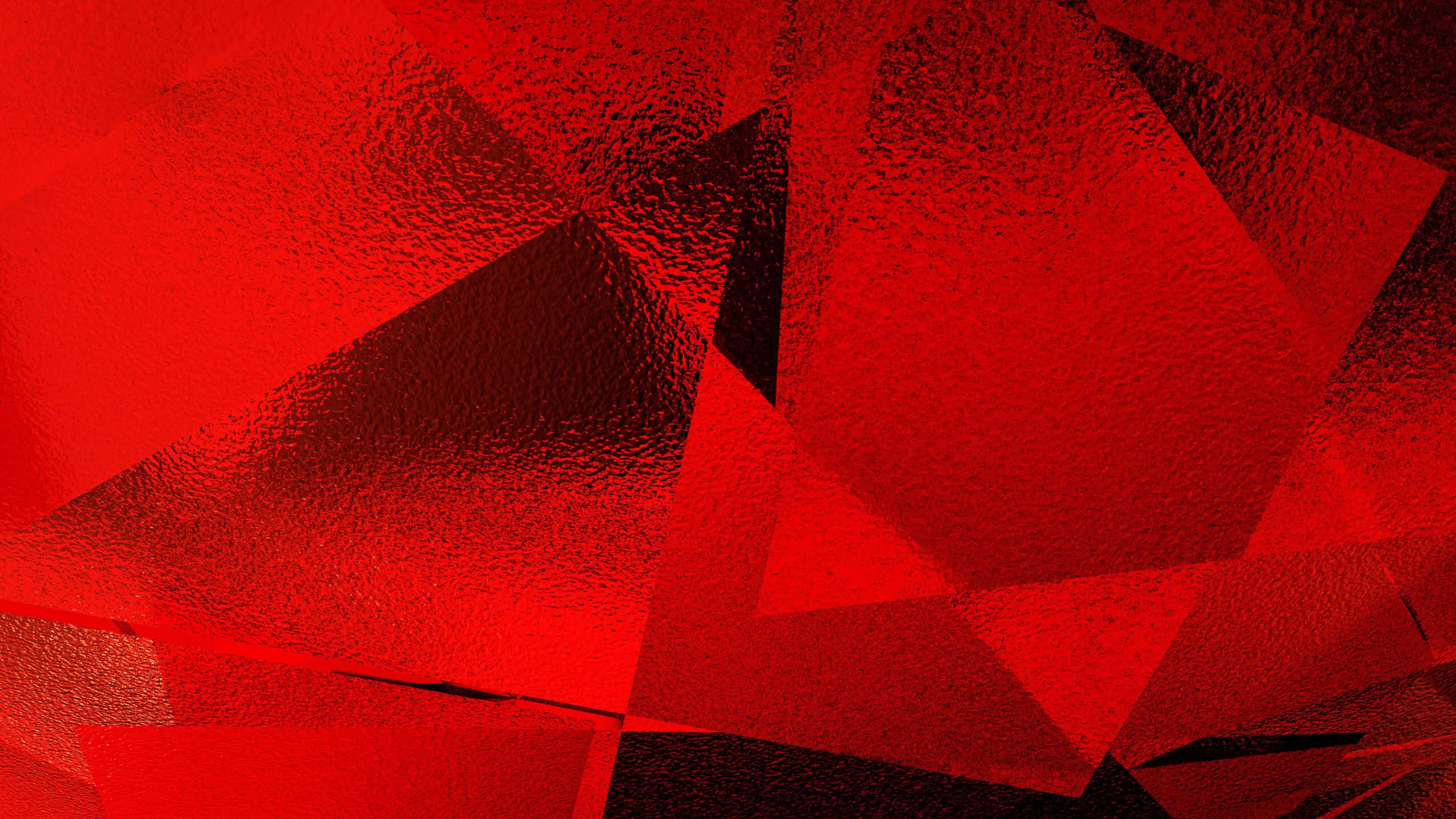 湖光山色風景 壁紙 — 充滿活力的紅色幾何碎片，帶有紋理金屬表面，創造出大膽的抽象構圖。