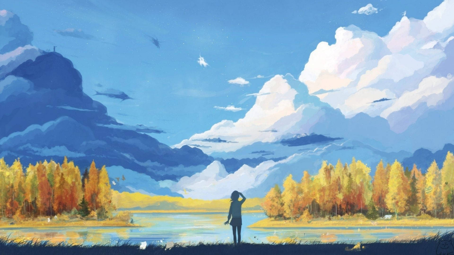 藍天下，人站在湖邊，有秋樹和山脈