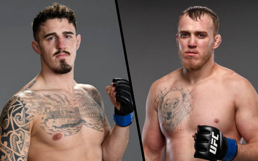 兩名有紋身的男性MMA拳手戴著UFC手套為宣傳照擺姿勢。