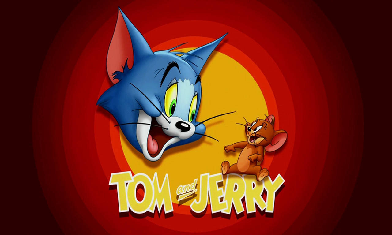 湯姆與傑瑞卡通經典作品 壁紙 — 藍色貓 Tom 同啡色老鼠 Jerry 喺紅色同黃色嘅同心圓背景前，睜大眼對峙。