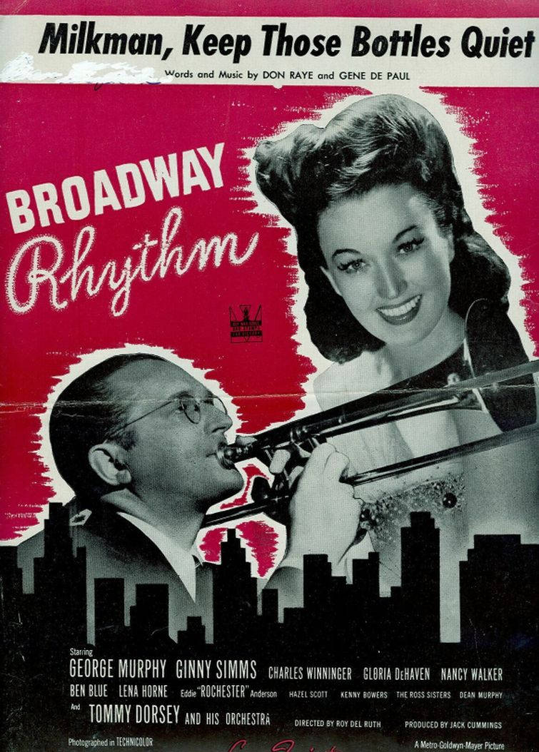 湯米·多西《百老匯節奏》1944年海報 壁紙 — 復古 Broadway Rhythm 電影海報，描繪一位微笑的女性和一位吹奏長號的男性，背景為紅色城市景觀。