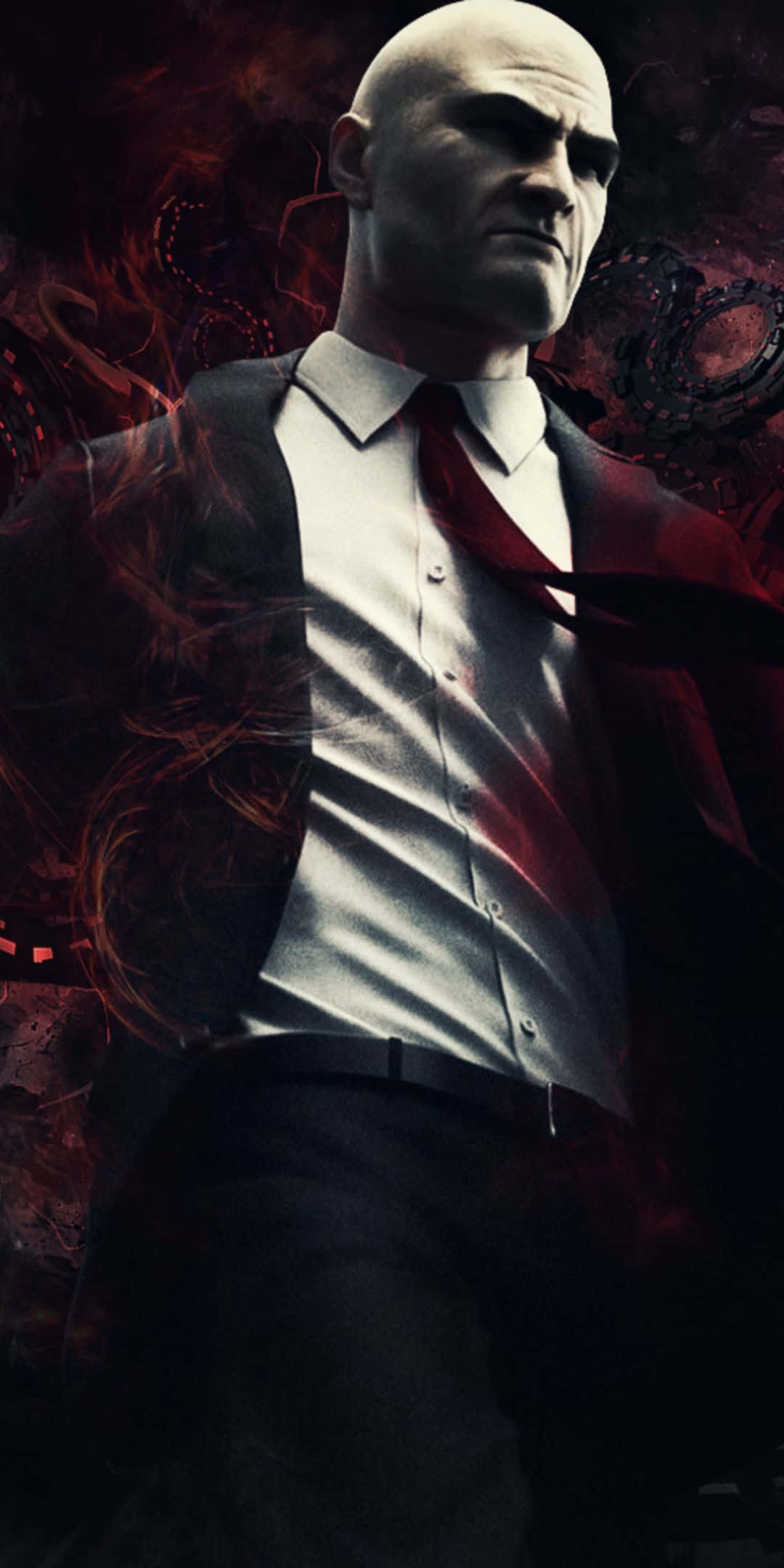 準備好迎接《殺手：赦免》的遊戲挑戰嗎？ 壁紙 — 一個光頭男人穿著白恤衫和紅領帶，站在一個帶有機械齒輪的暗紅色漩渦背景前。