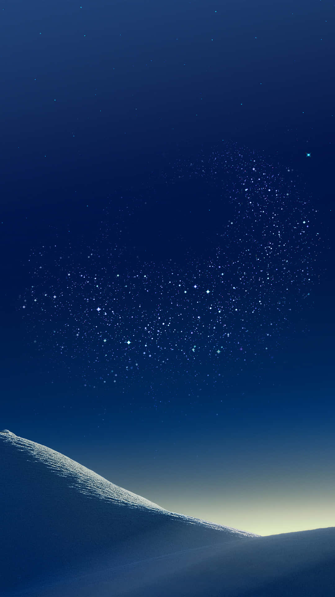 雪覆蓋的山脊在星空下