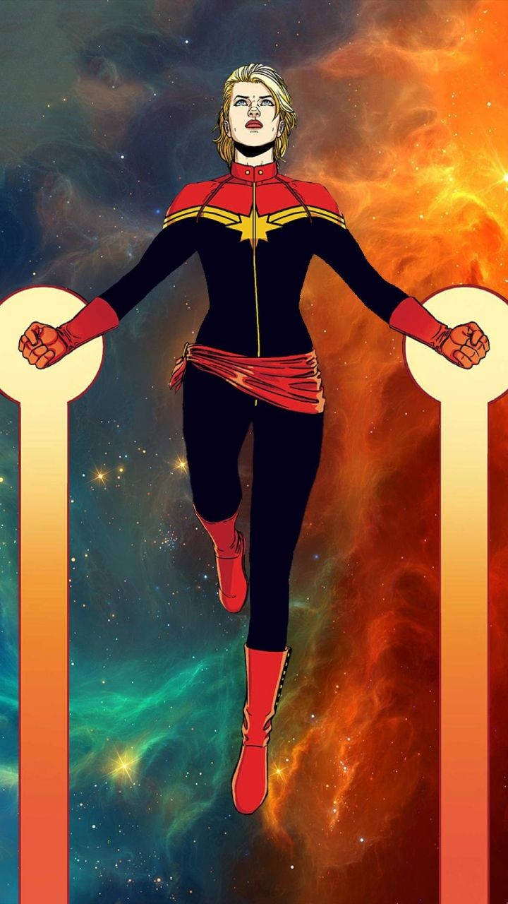 Captain Marvel 漂浮在發光的柱子之間，身處色彩繽紛的太空星雲中。
