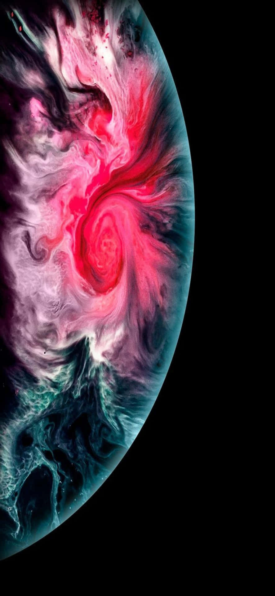 在黑色太空中帶有粉紅色和藍綠色漩渦的鮮豔宇宙星雲。