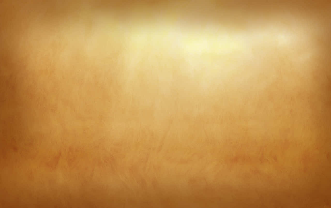 Brown Texture 桌布 壁紙 — 溫暖金色紋理背景，帶有柔和漸變燈光和細微表面瑕疵。