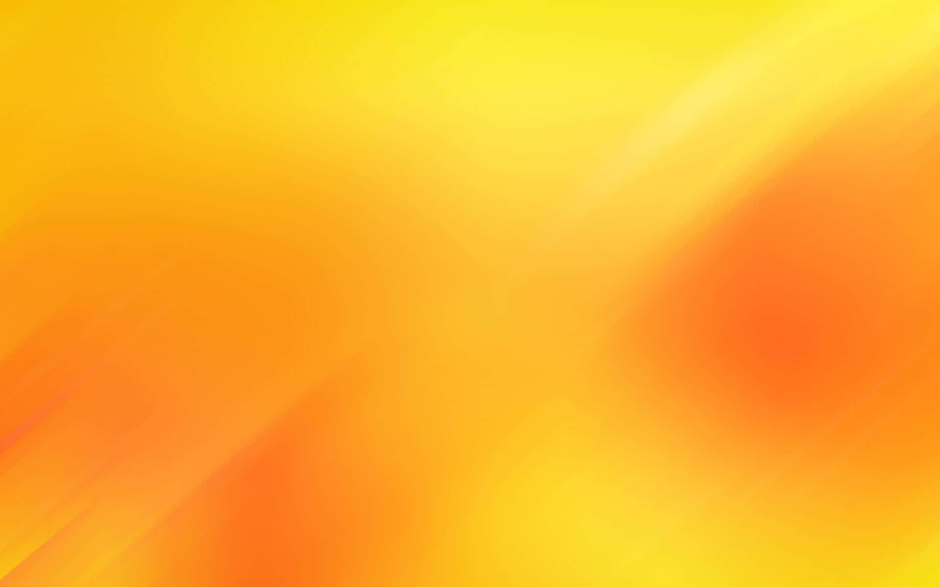 Yellow Gradient 桌布 壁紙 — 溫暖黃色和橙色色調的平滑漸變，柔和地融合在整個畫面中。