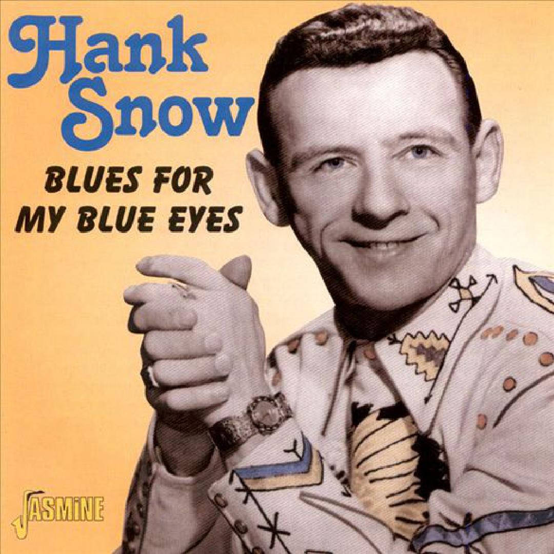 漢克·斯諾《為我藍眼的藍調》 壁紙 — Hank Snow 穿著圖案西部襯衫，在溫暖黃色背景的復古專輯封面上指向觀眾。