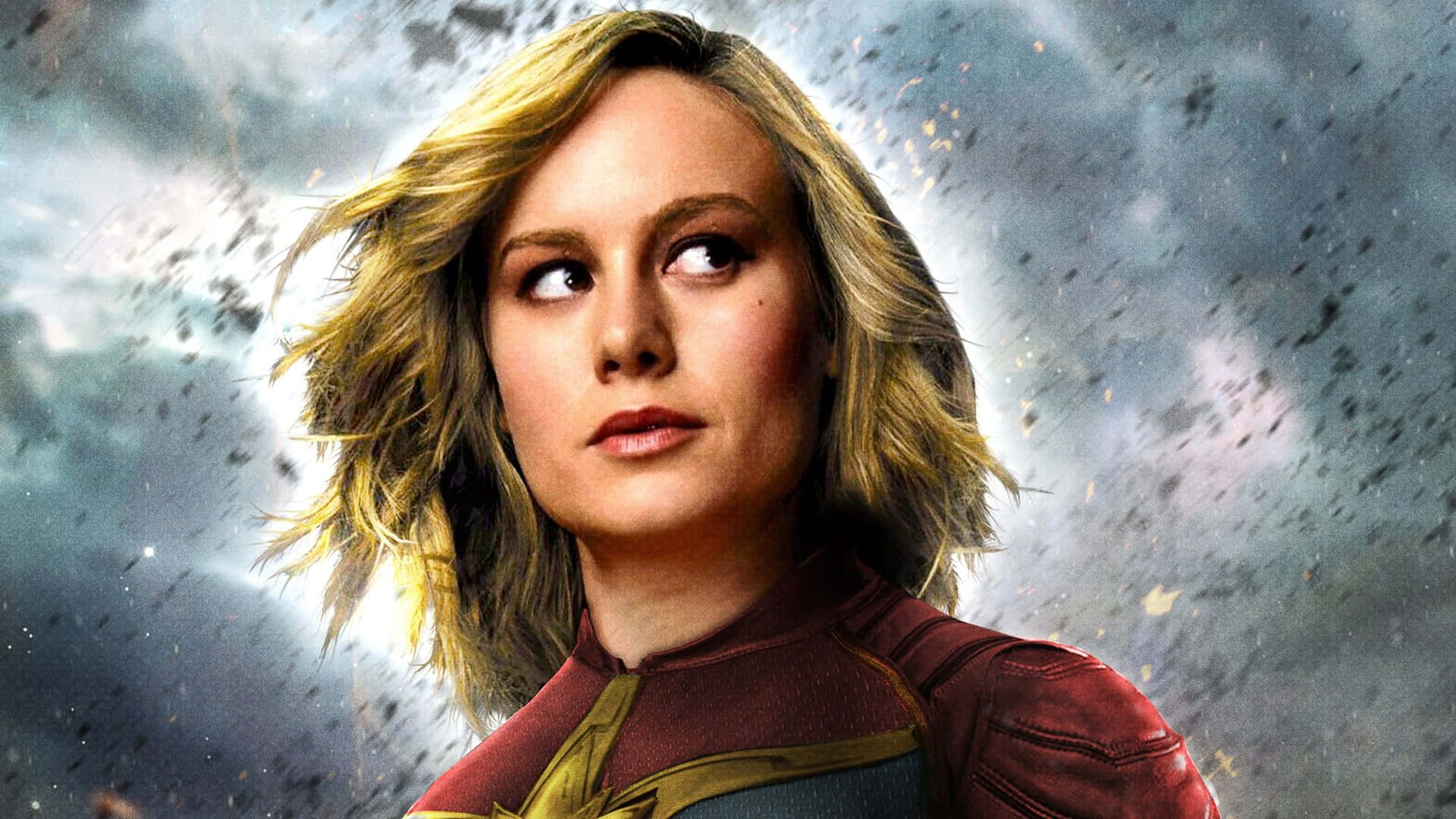 Captain Marvel 身穿戰衣，身處宇宙爆炸之中。