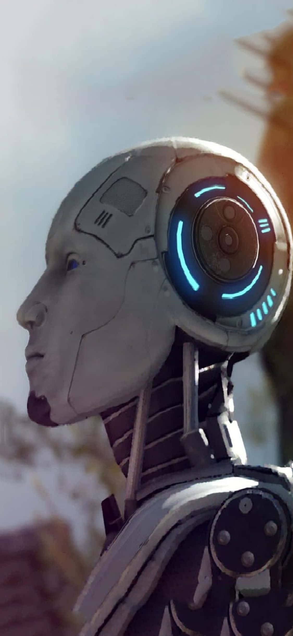 潛入《The Talos Principle》世界，體驗 iPhone X 的沉浸旅程 壁紙 — 一個未來主義的人形機械人，頭部有發光的藍色圓形介面，側面輪廓映襯著朦朧的天空。