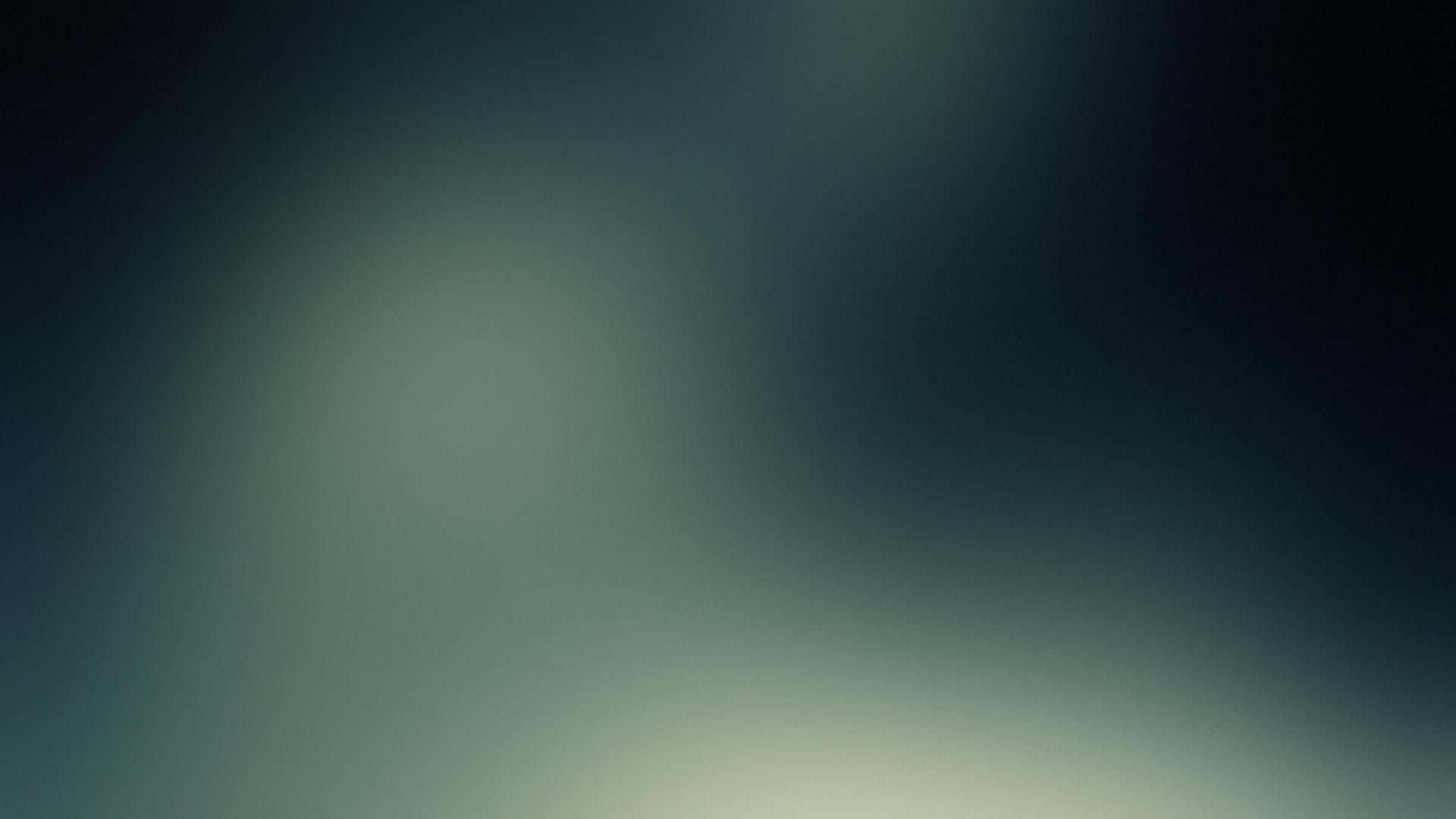 濃郁深藍漸層背景 壁紙 — 柔和嘅青綠色同深藍色漸變，帶有發光嘅光點，營造出寧靜嘅抽象背景。