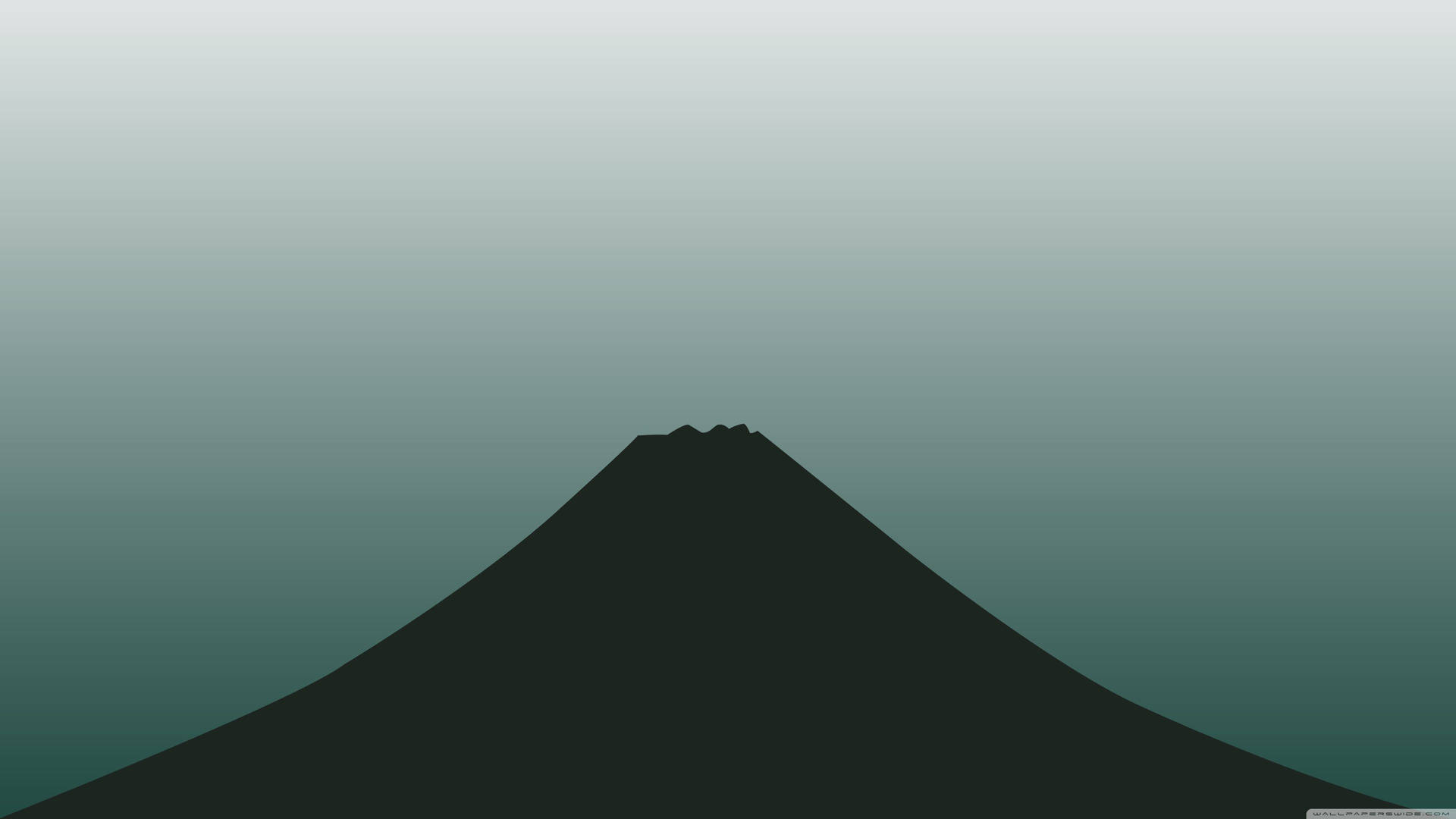 富士山剪影襯托漸變青綠色天空