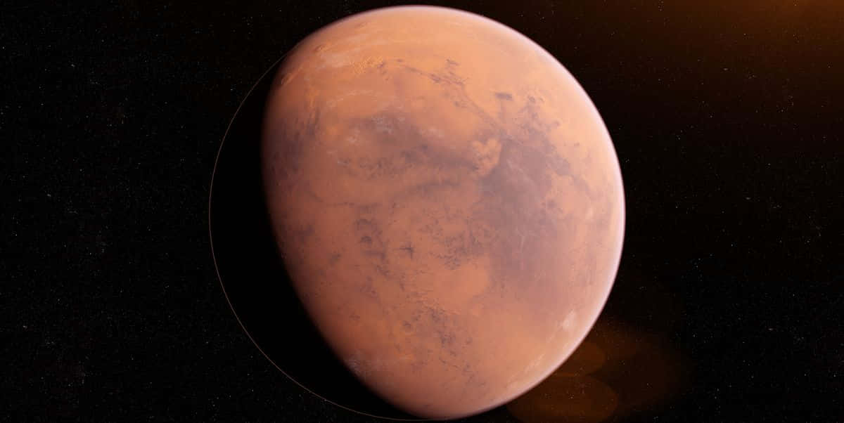 火星行星在太空中發光，伴有星星和大氣薄霧