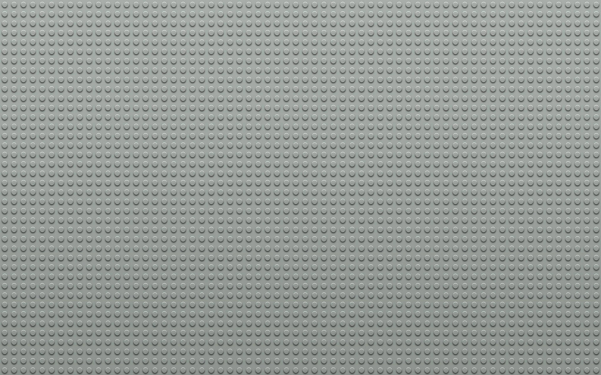 灰色LEGO底板，重複的圓形凸點圖案。
