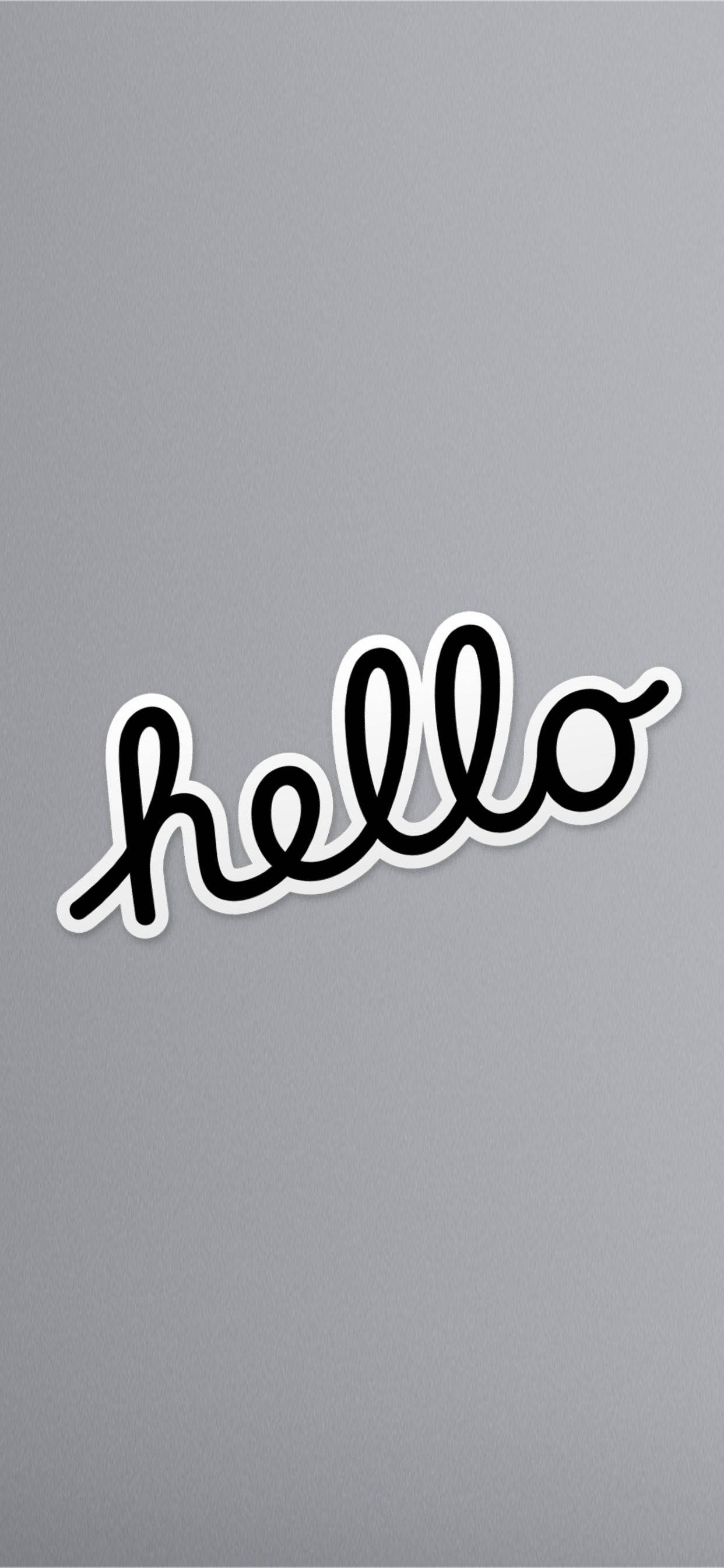 灰色背景手寫體「Hello」問候圖 壁紙 — 在純灰色背景上，一個極簡黑色草書 'hello' 貼紙，帶有白色邊框。