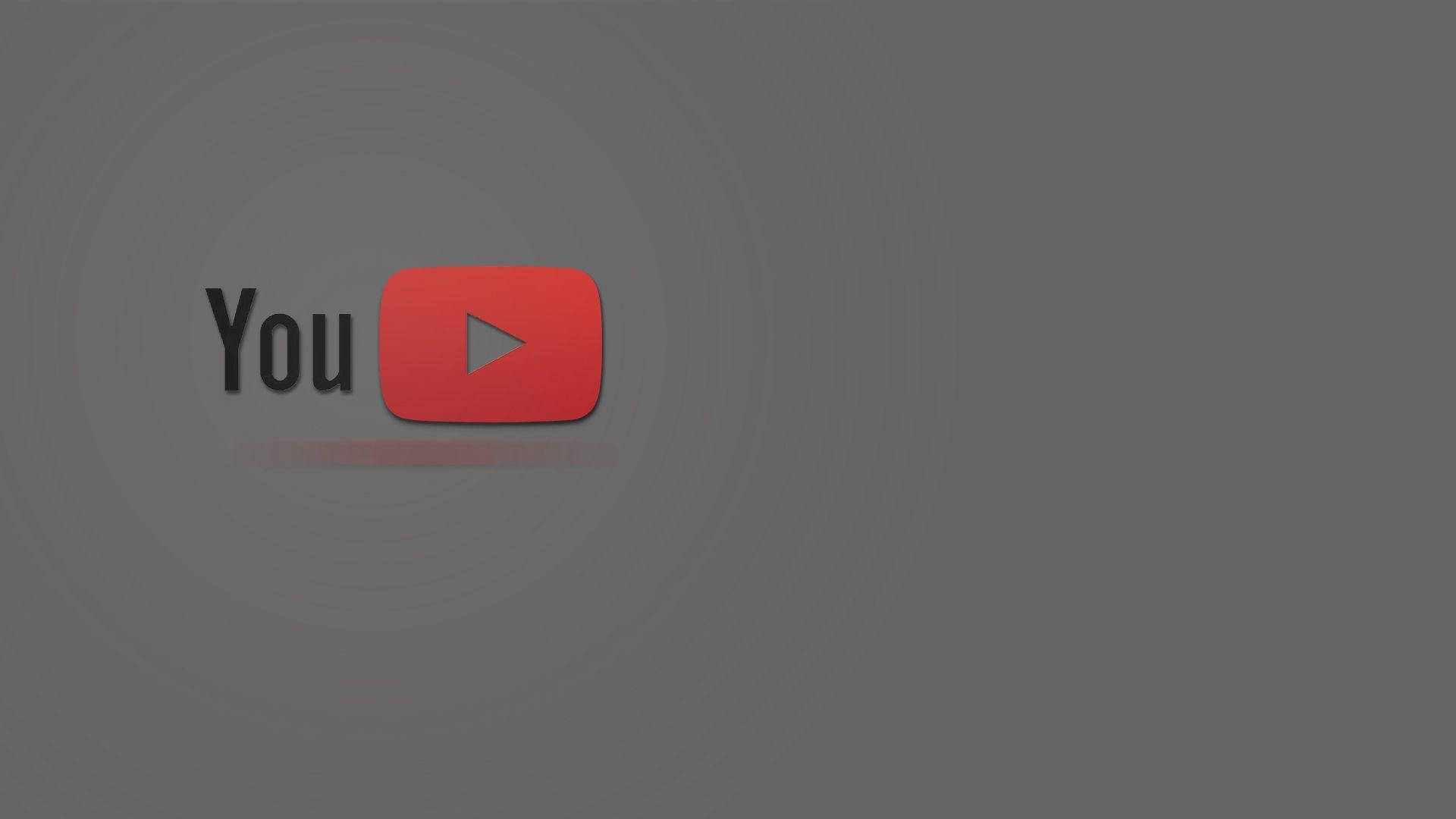 灰色藝術風格YouTube標誌 壁紙 — YouTube 標誌居中於深灰色漸變背景上，帶有微妙的同心圓。