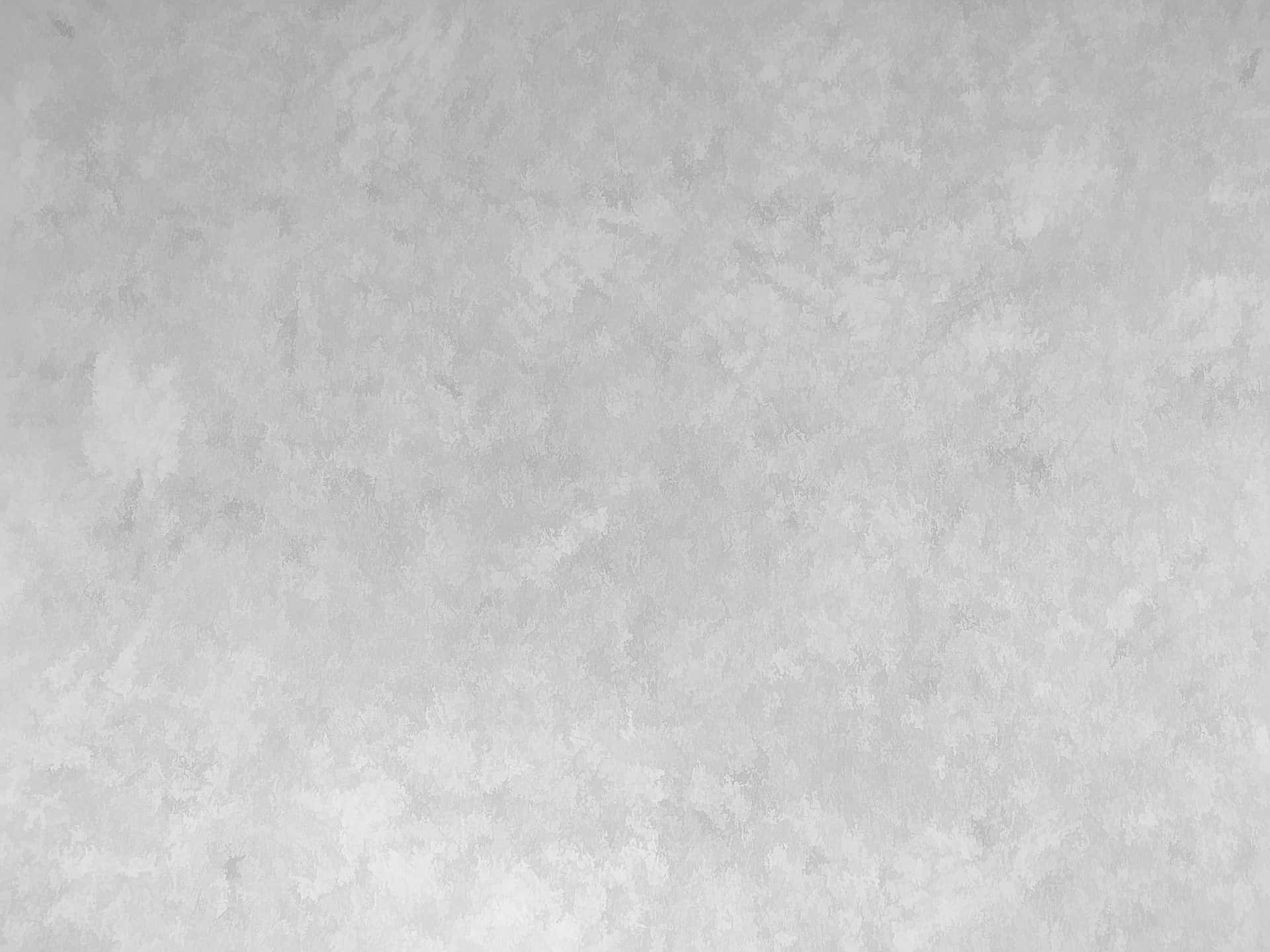 光滑淺灰色紋理牆壁，帶有細微斑駁圖案。
