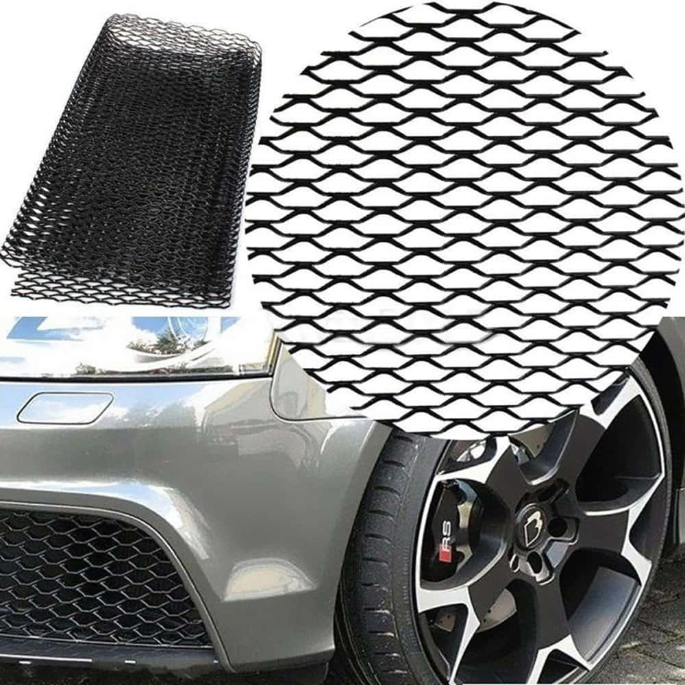 Car Grill 桌布 壁紙 — 灰色跑車特寫，展示黑色網狀格柵和帶紅色制動卡鉗的合金輪圈。