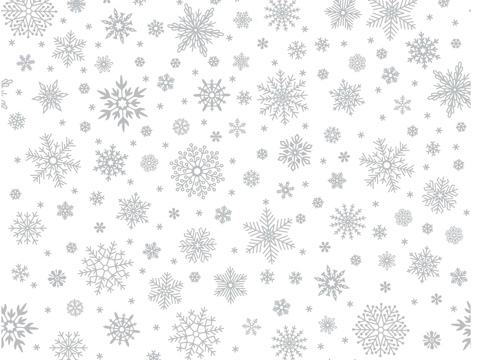 白色背景上的銀色雪花圖案，適合冬季裝飾。