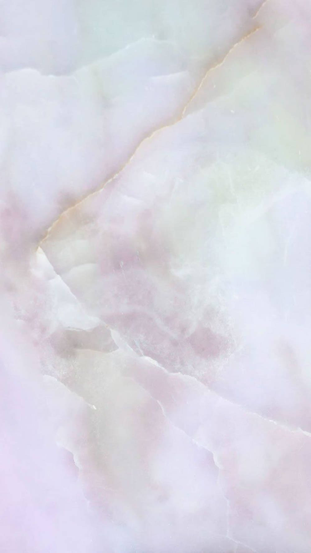 粉紅色和白色大理石特寫，帶有金色紋理