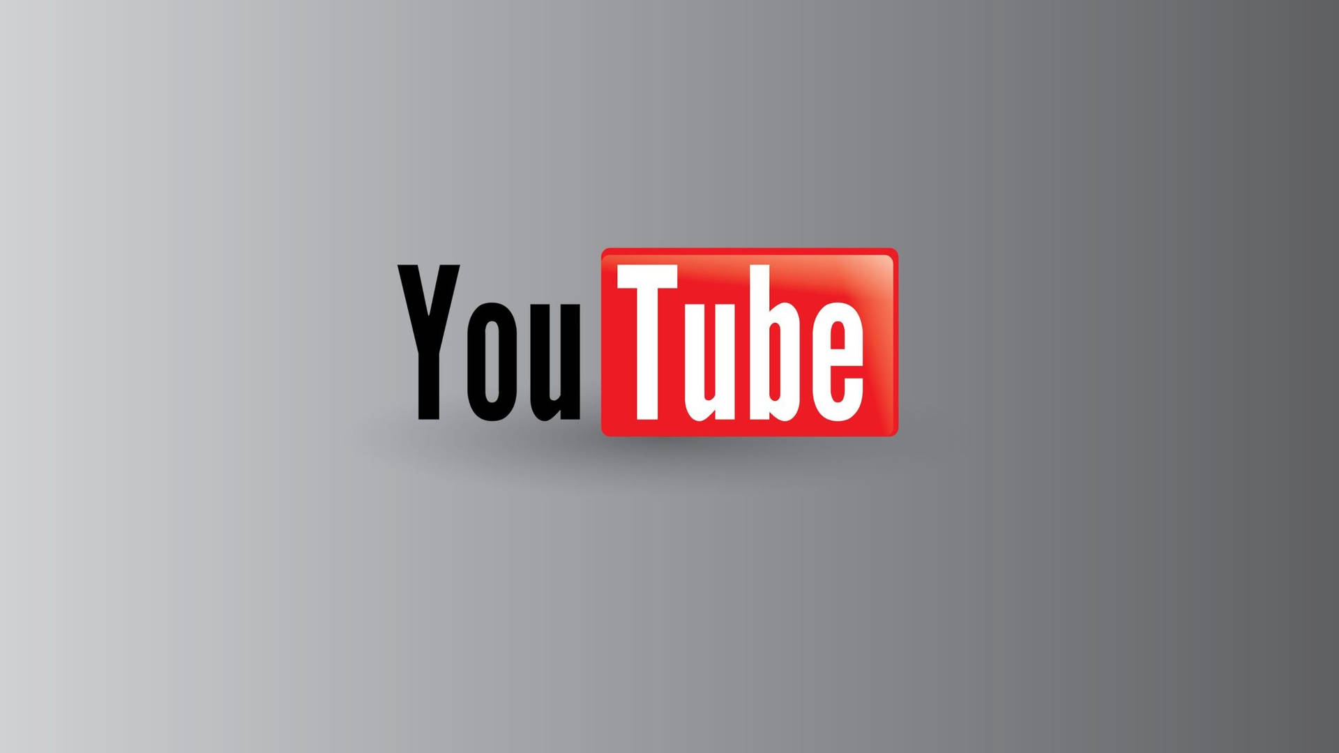 YouTube 標誌在灰色漸變背景上帶有柔和陰影