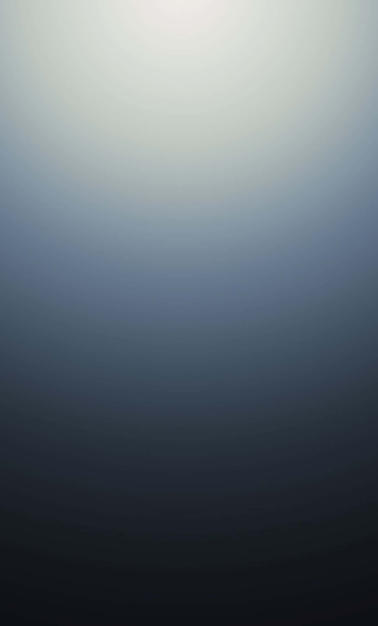 灰階漸層背景 壁紙 — 從柔和白色到深黑色的寧靜漸變，喚起平靜與神秘。
