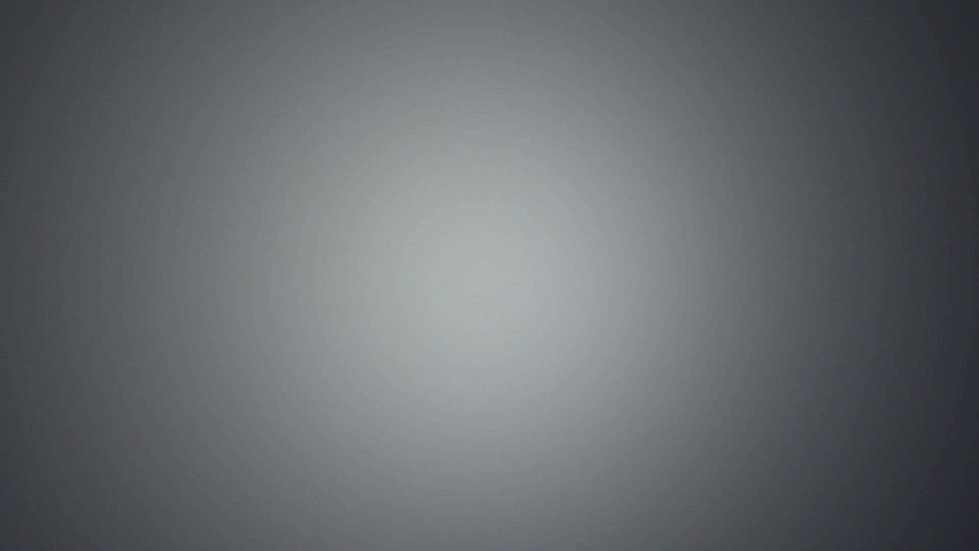 灰階漸層自然背景 壁紙 — 一款極簡漸變牆紙，從深灰色過渡到中央的淺灰色。