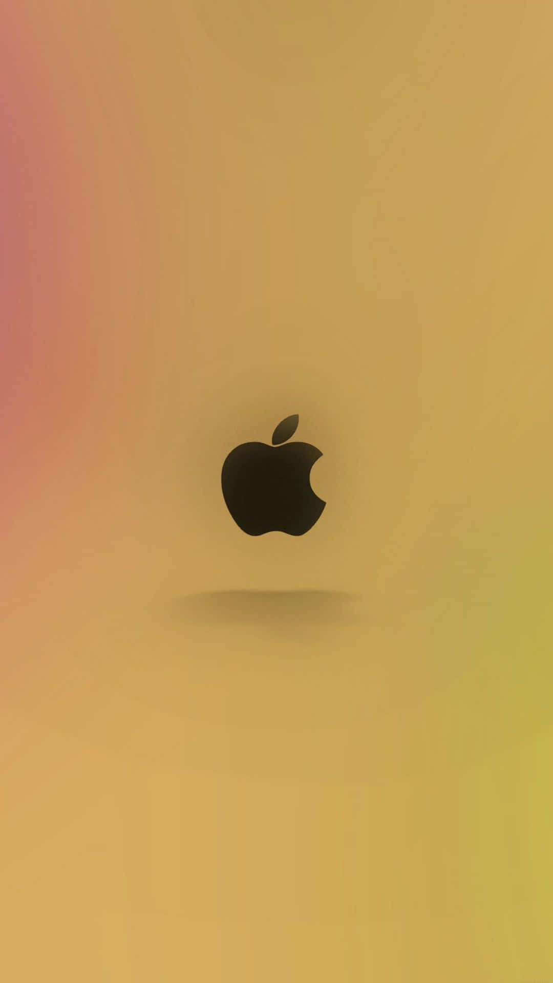 暖色漸變背景上的黑色Apple標誌